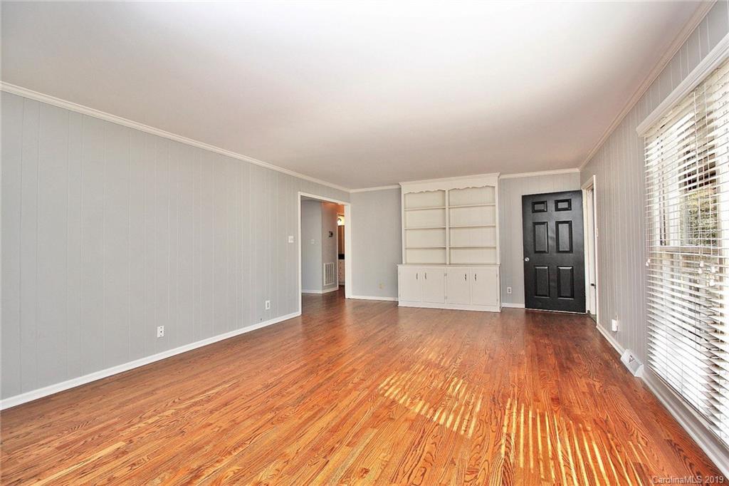 3399 Pleasant Road Fort Mill, SC 29708 - Photo 47 of 48 wooden floor in an empty room with a window