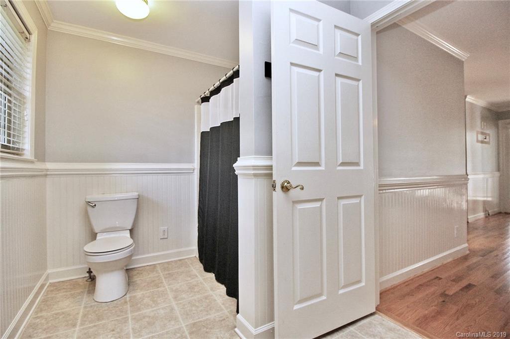 3399 Pleasant Road Fort Mill, SC 29708 - Photo 9 of 48 a bathroom with a toilet and a shower