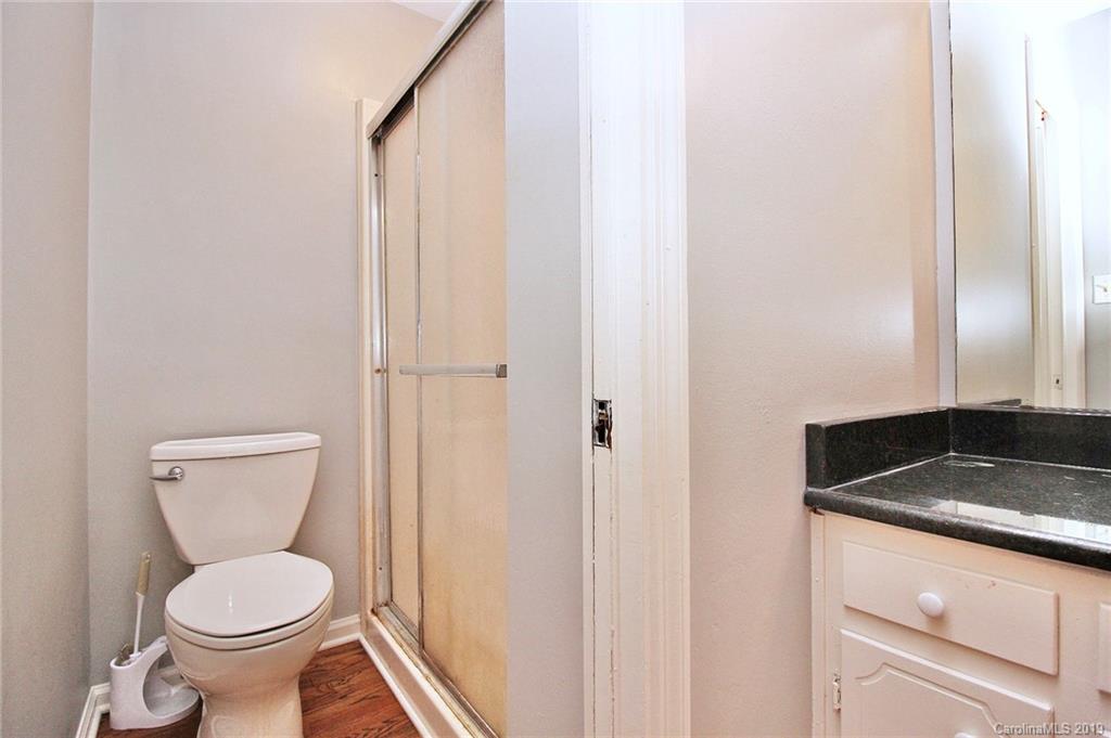 3399 Pleasant Road Fort Mill, SC 29708 - Photo 10 of 48 a bathroom with a toilet a sink and mirror