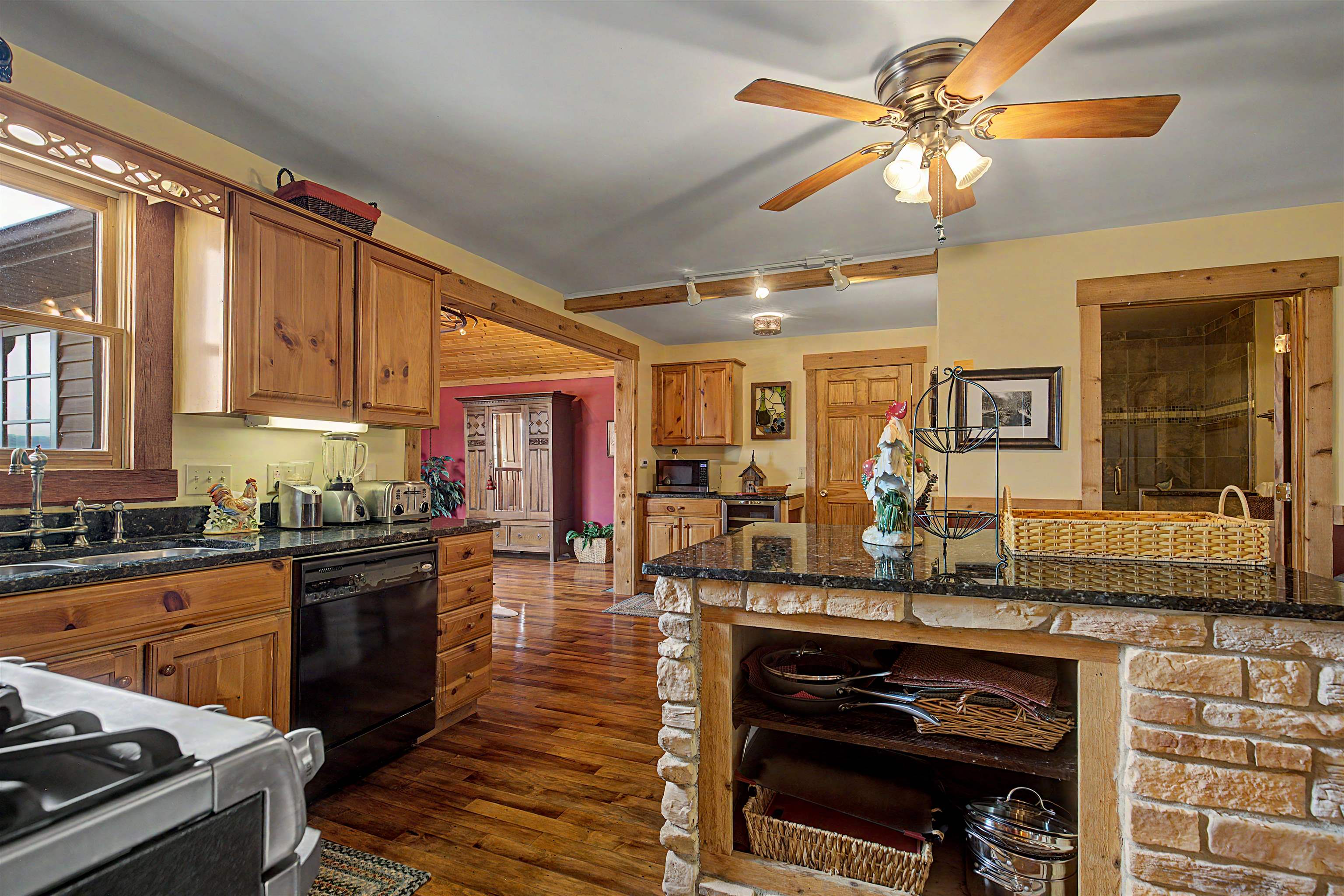 2287 West Hanover Road Hanover, IL 61041 - Photo 13 of 65 a kitchen with stainless steel appliances granite countertop a stove and cabinets