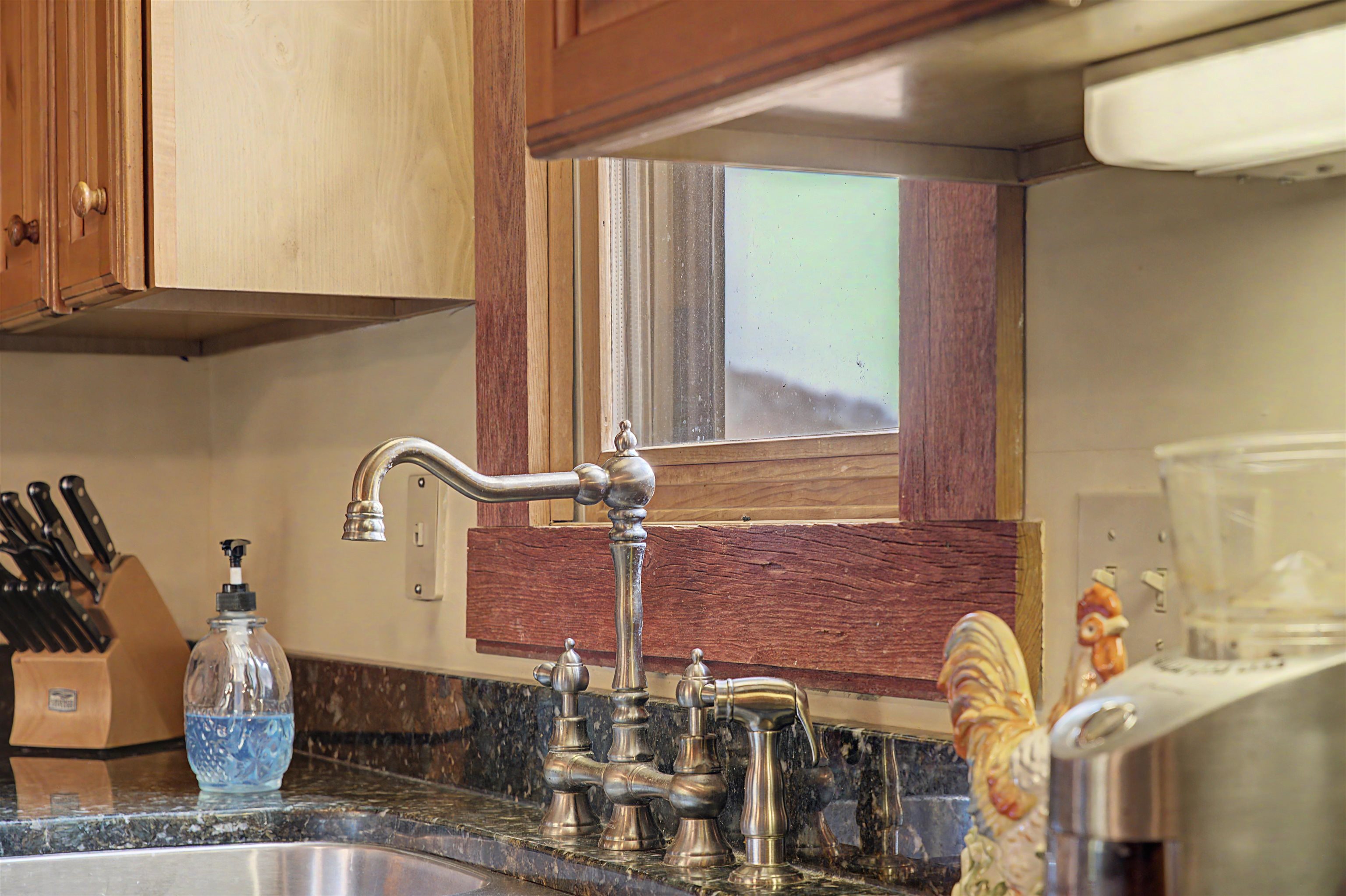 2287 West Hanover Road Hanover, IL 61041 - Photo 15 of 65 a bathroom with a sink and a mirror