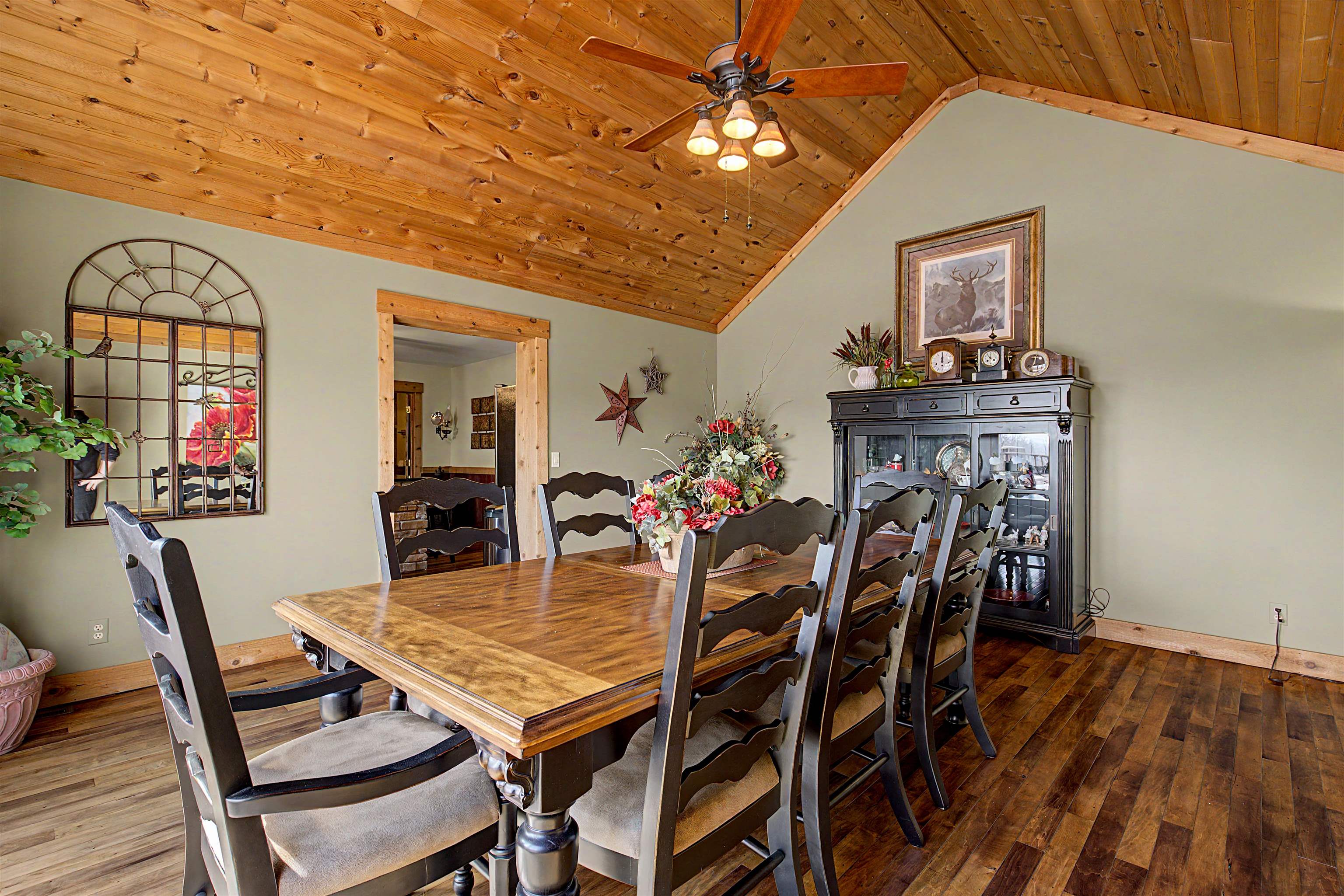 2287 West Hanover Road Hanover, IL 61041 - Photo 18 of 65 a view of a dining room with furniture and a chandelier