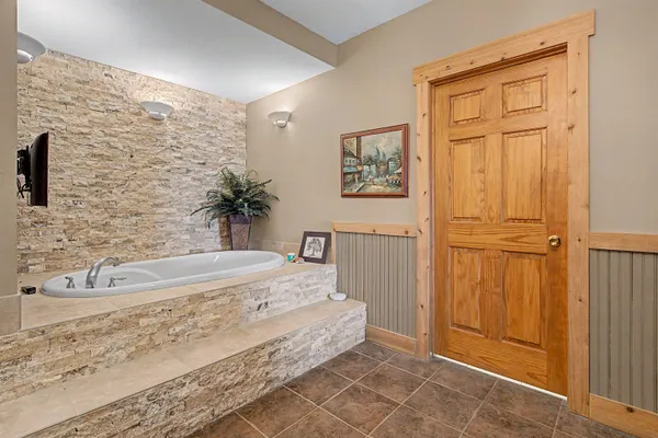 a bathroom with a sink a mirror and a toilet