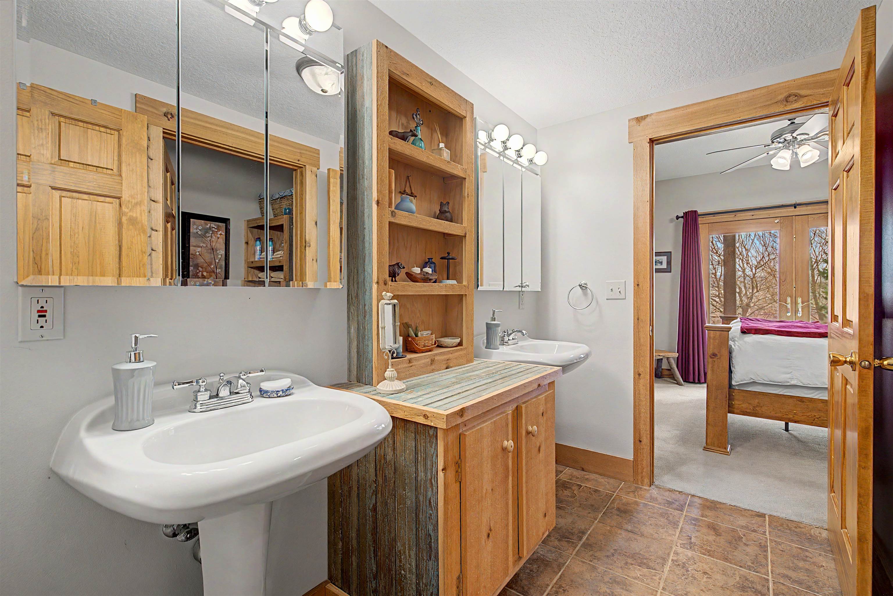 2287 West Hanover Road Hanover, IL 61041 - Photo 33 of 65 a bathroom with a sink a toilet and a mirror