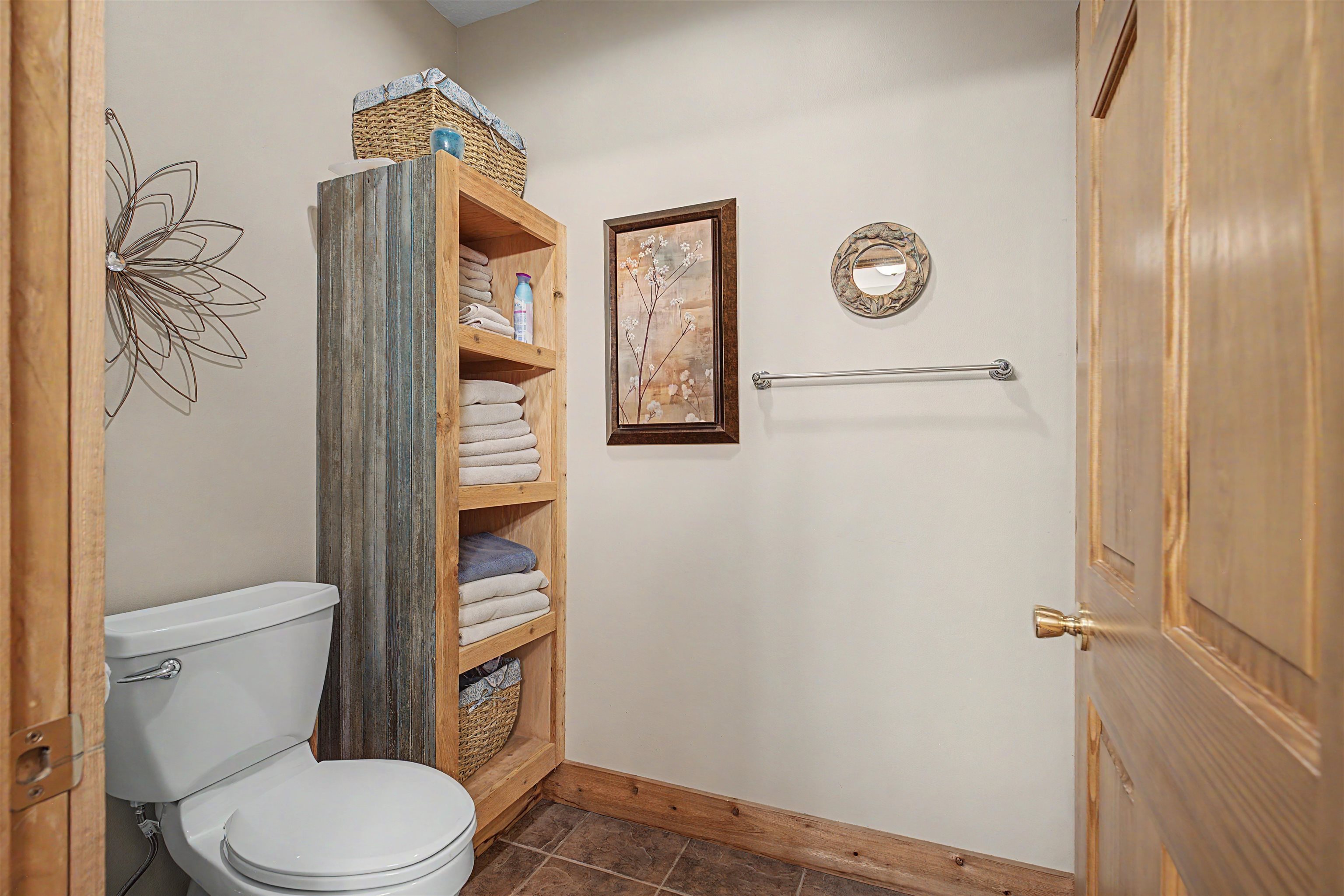 2287 West Hanover Road Hanover, IL 61041 - Photo 34 of 65 a white toilet sitting next to a shower curtain