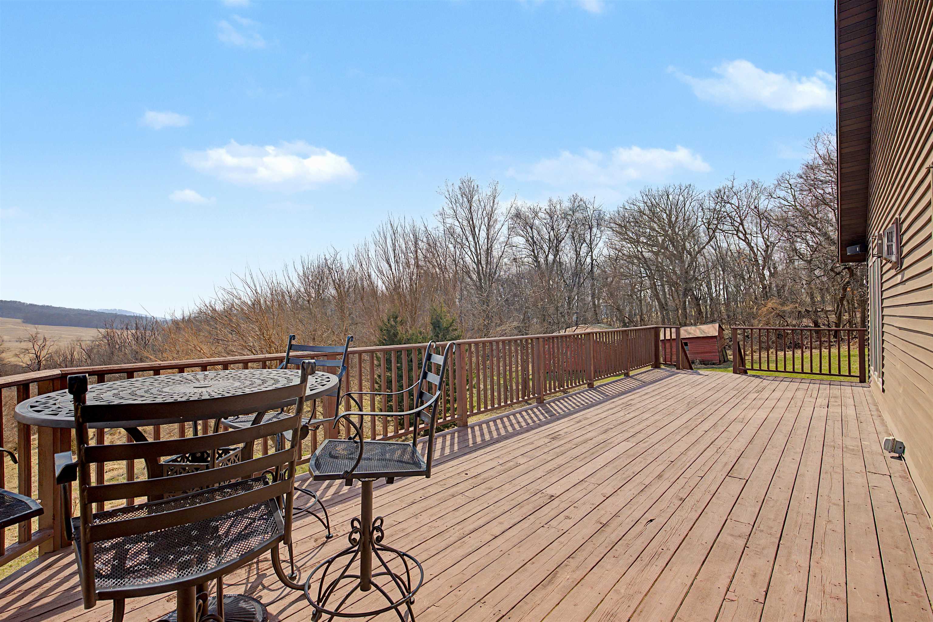 2287 West Hanover Road Hanover, IL 61041 - Photo 57 of 65 a view of balcony with wooden floor and city view