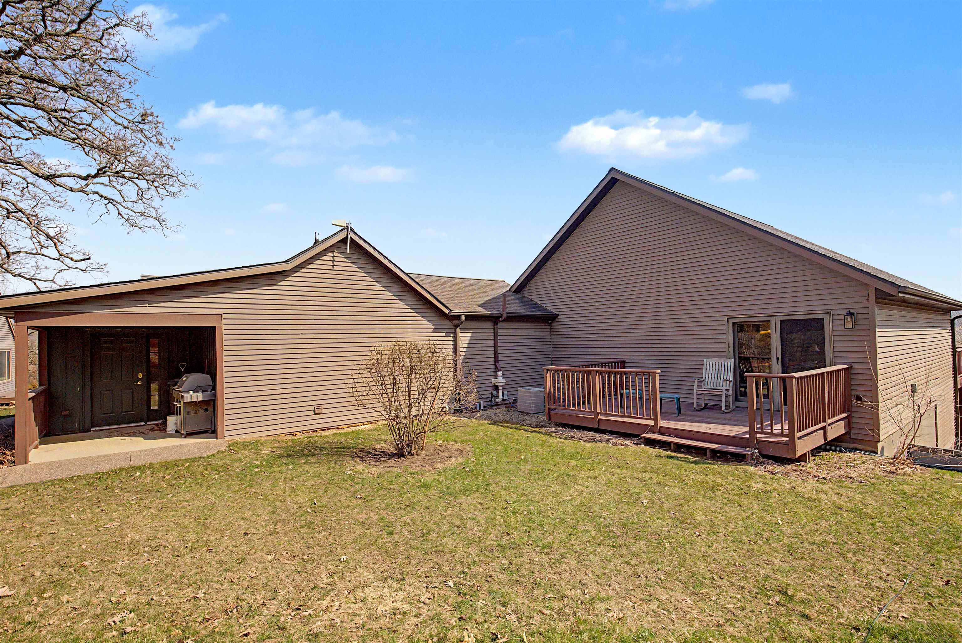 2287 West Hanover Road Hanover, IL 61041 - Photo 58 of 65 front view of a house with a yard and fence