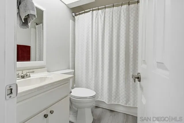 a large white bed in a white room