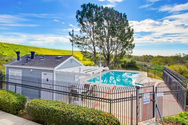 a front view of a house with yard
