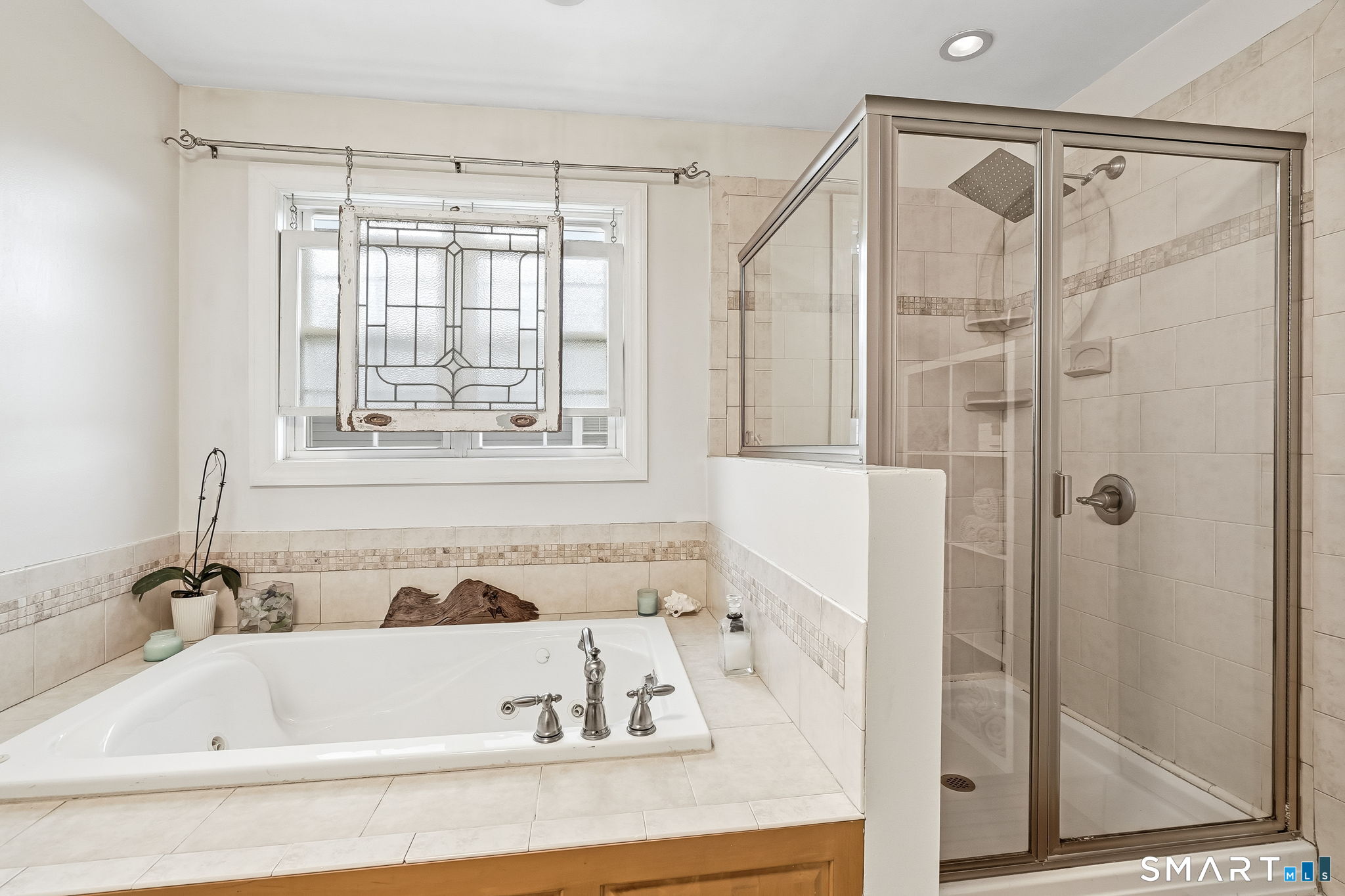 80 3rd Avenue Stratford, CT 06615 - Photo 28 of 40 a bathroom with a bathtub and a shower