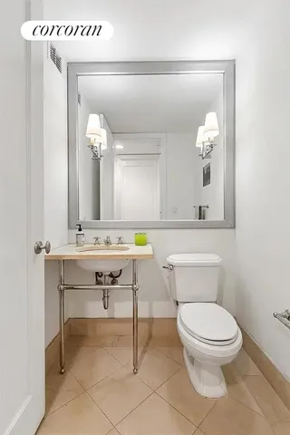 a bathroom with a sink a toilet and a bathtub