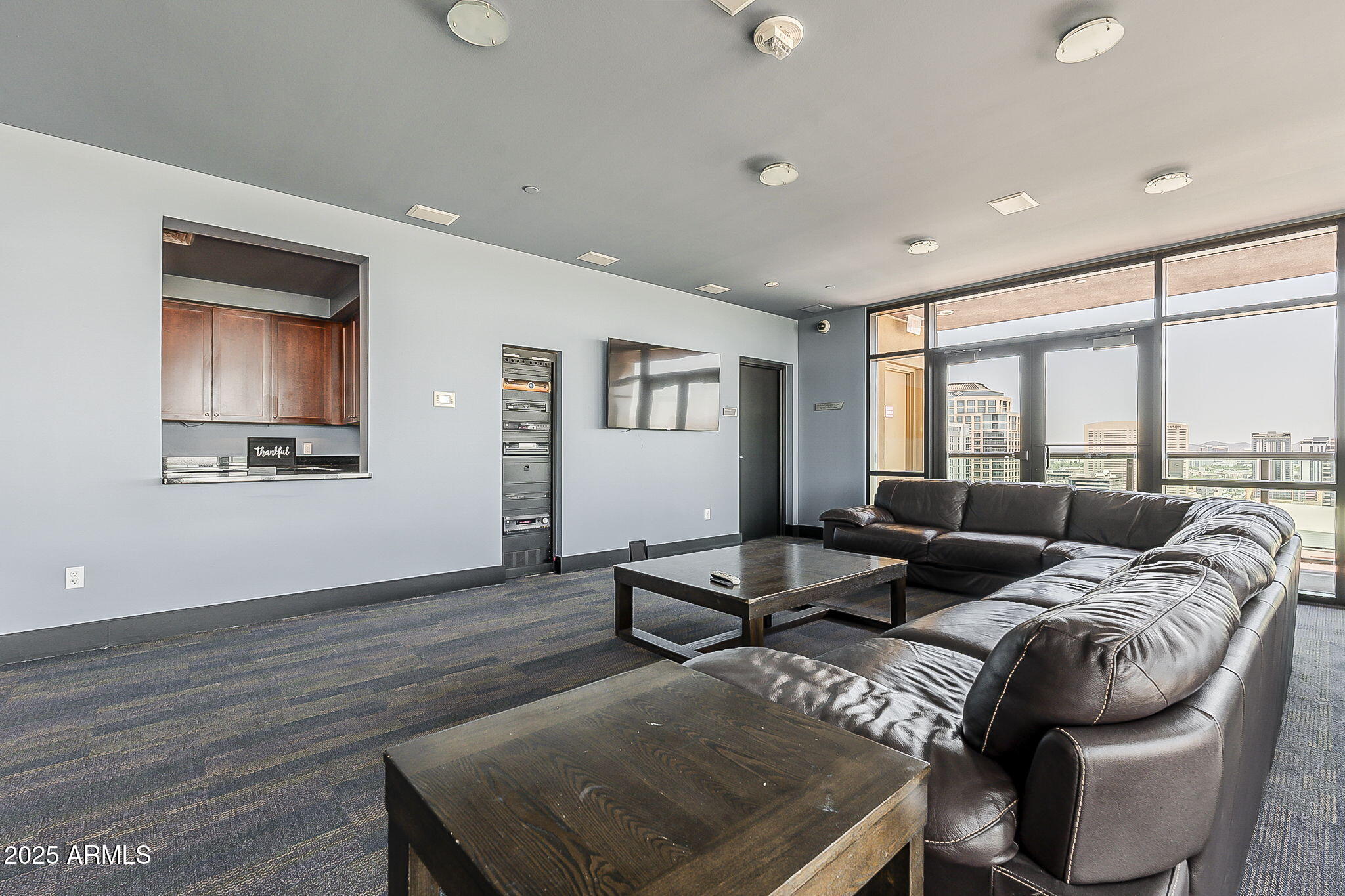 310 South 4th Street, Unit 1601 Phoenix, AZ 85004 - Photo 42 of 55 Meeting Room Rooftop w Firepit