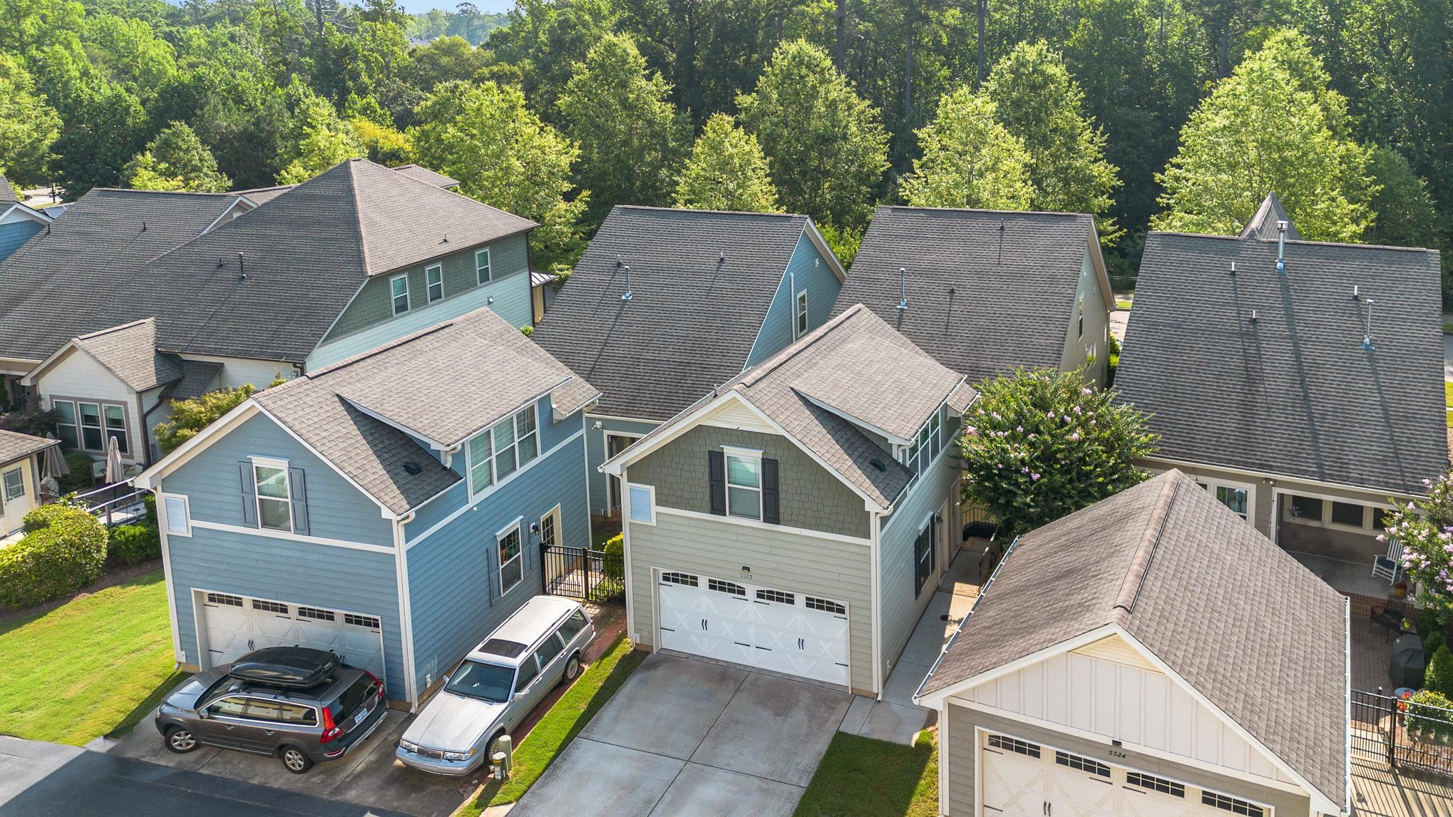 5522 Wade Park Boulevard Raleigh, NC 27607 - Photo 15 of 17 an aerial view of a house with a yard