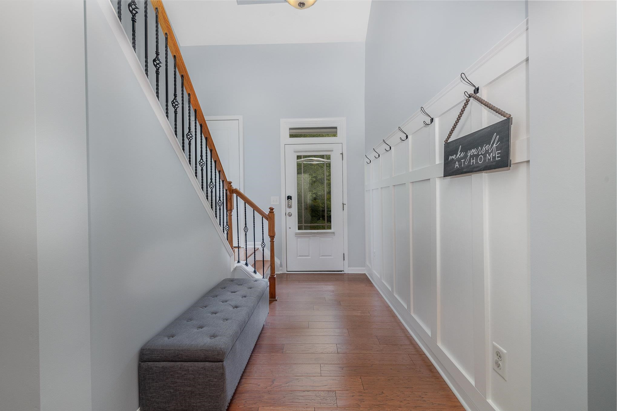 5522 Wade Park Boulevard Raleigh, NC 27607 - Photo 2 of 17 a view of staircase with wooden floor and stairs