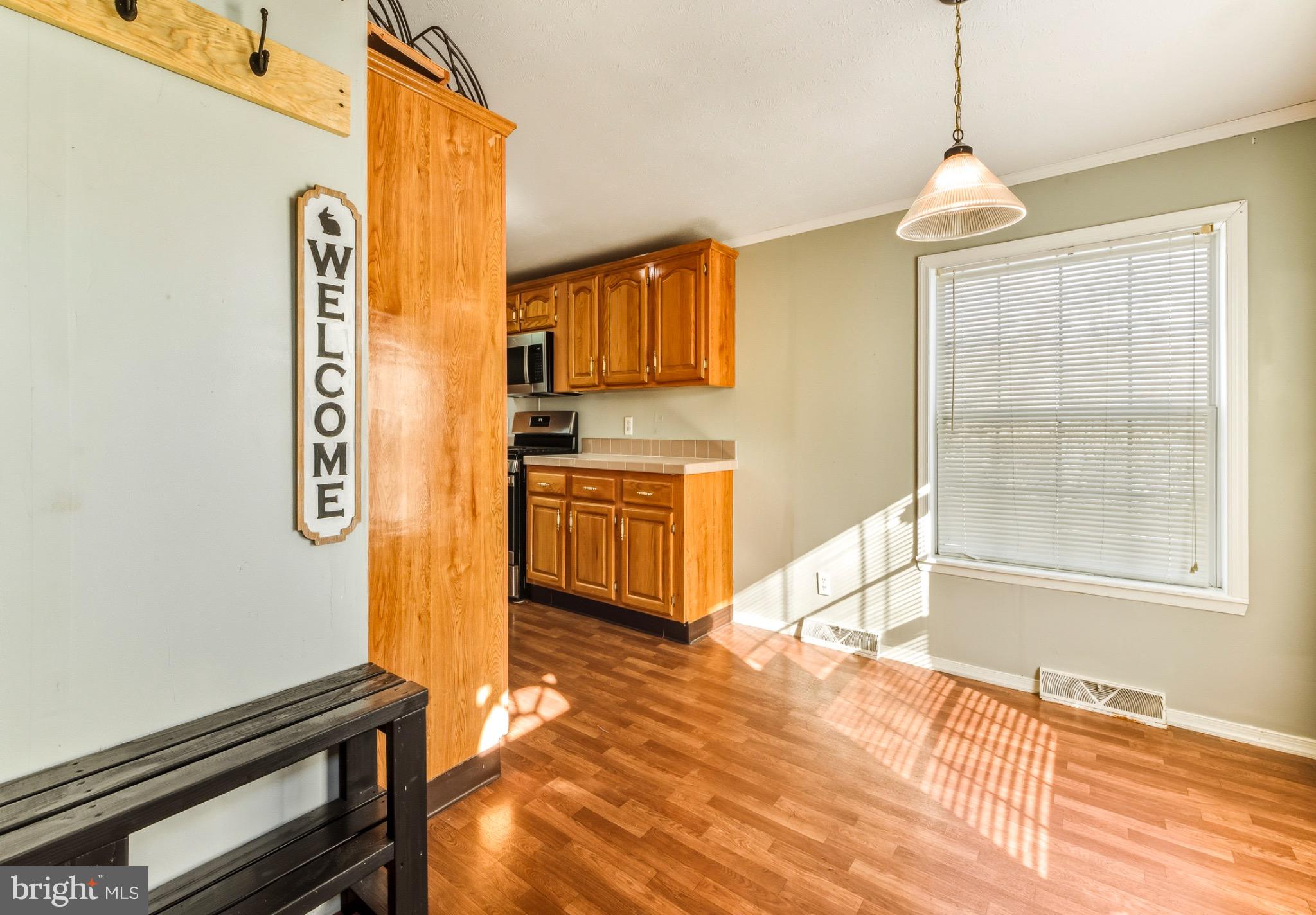 2110 Mays Landing Road, Unit 193 Millville, NJ 08332 - Photo 11 of 22 Welcoming kitchen with warm wooden accents.