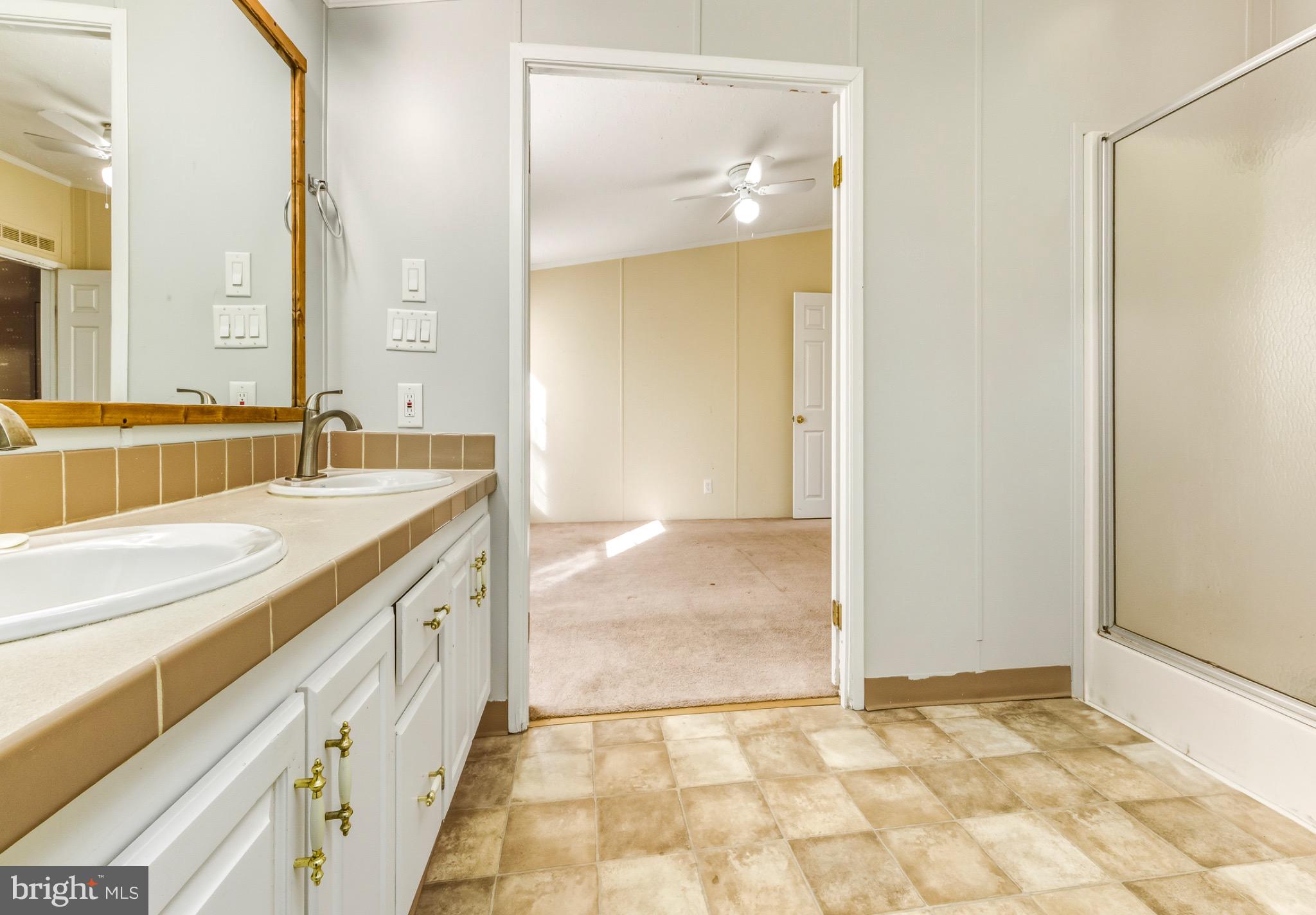 2110 Mays Landing Road, Unit 193 Millville, NJ 08332 - Photo 20 of 22 Spacious bathroom with natural light.