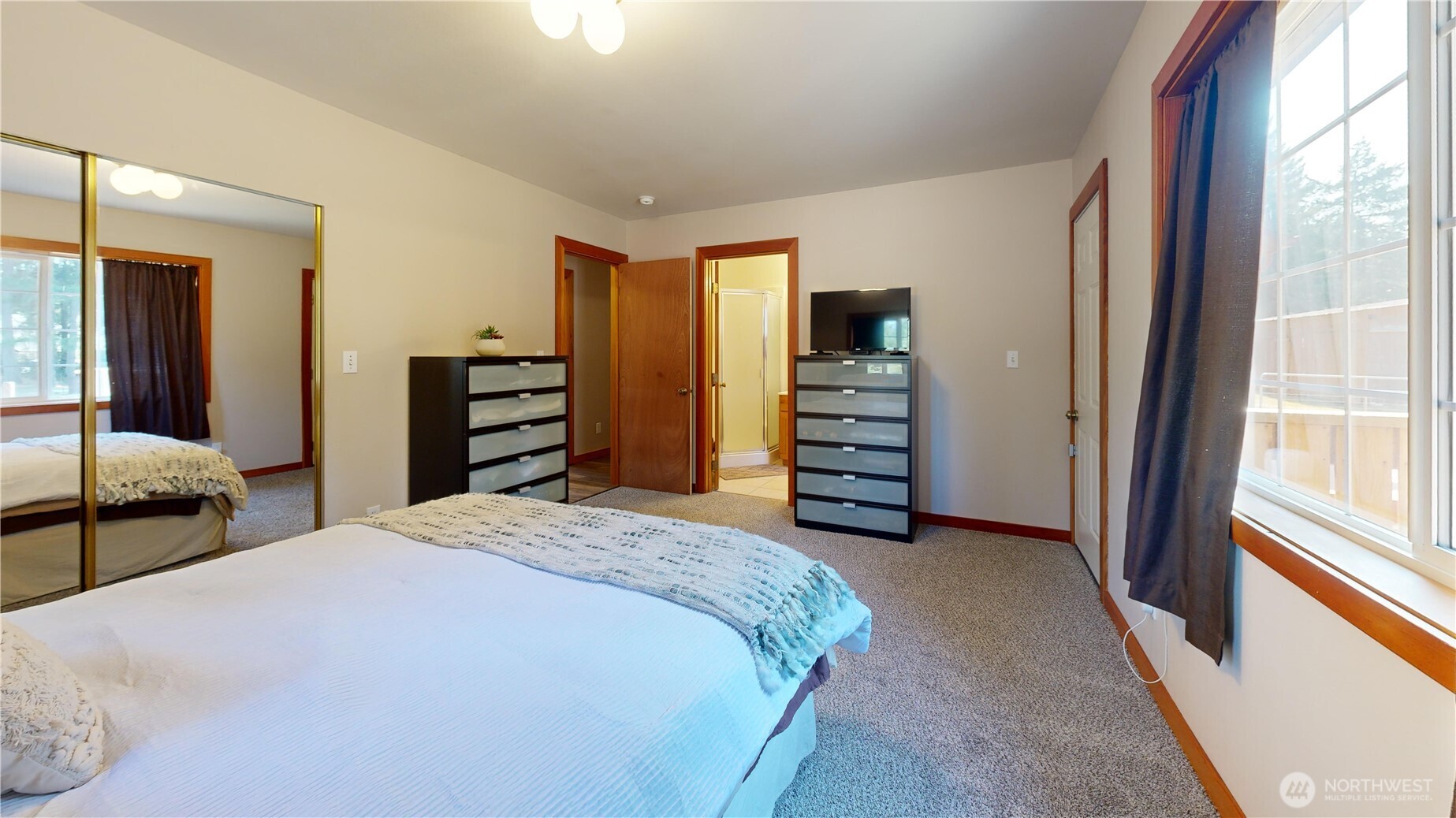 35812 Allen Road South Roy, WA 98580 - Photo 11 of 39 a bedroom with a bed and a large closet