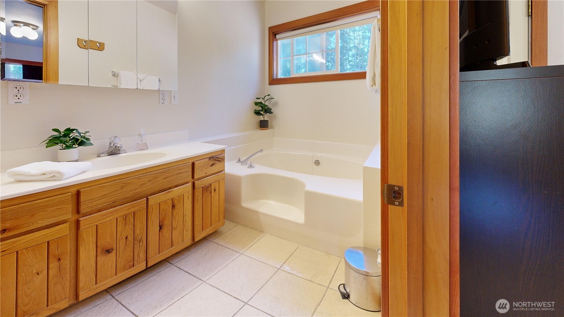 35812 Allen Road South Roy, WA 98580 - Photo 14 of 39 a bathroom with a tub sink and mirror