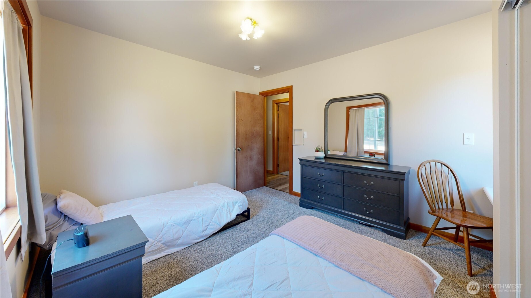 35812 Allen Road South Roy, WA 98580 - Photo 16 of 39 a bedroom with a bed and a furniture
