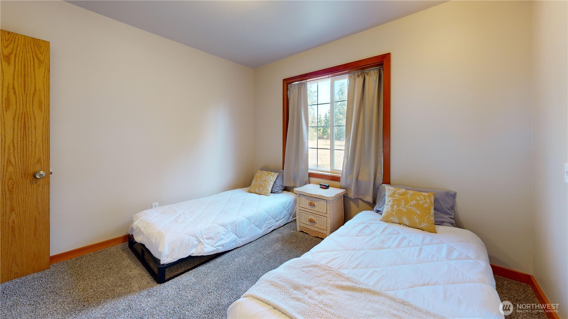 35812 Allen Road South Roy, WA 98580 - Photo 18 of 39 a bedroom with two beds and a window