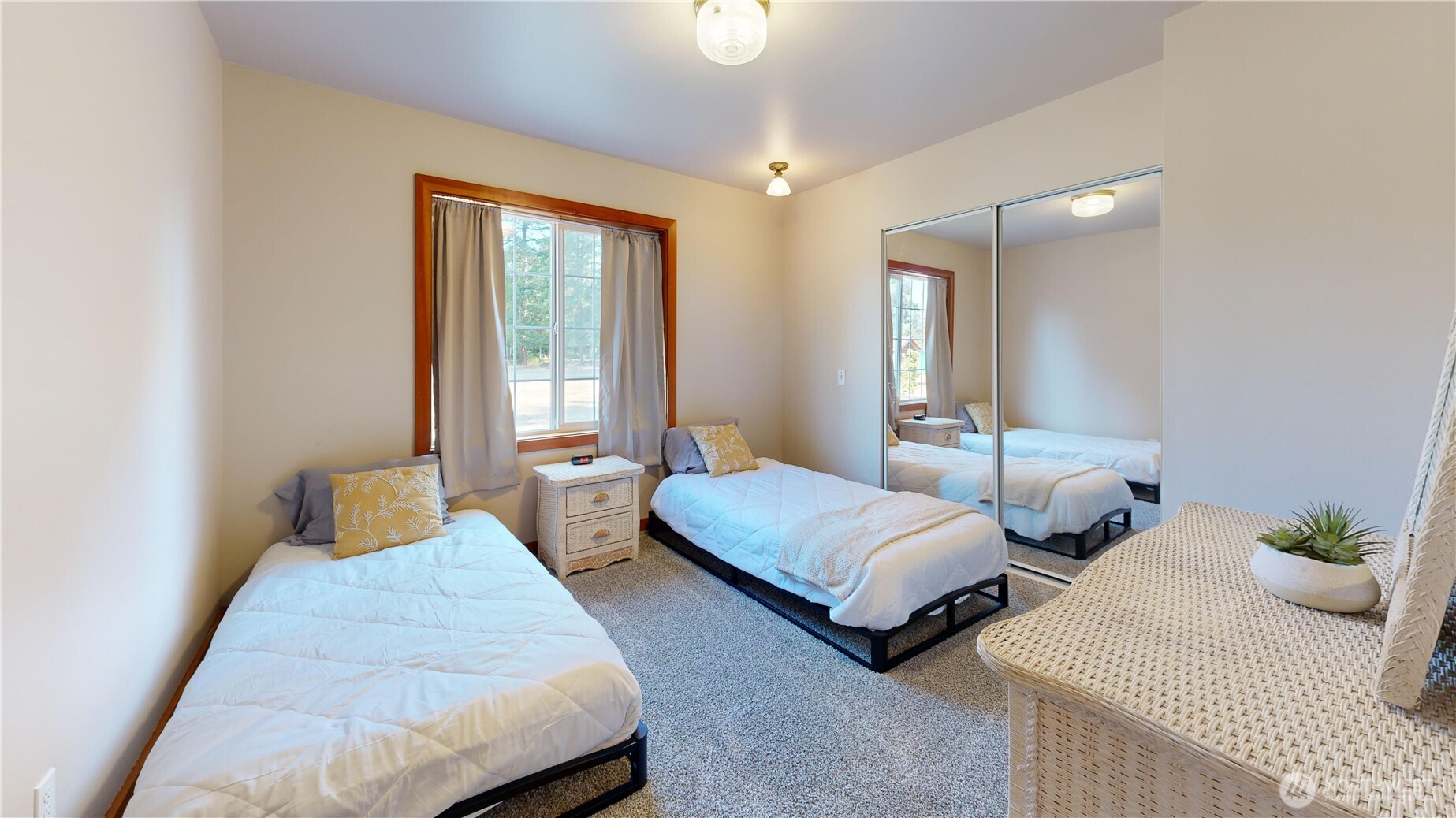 35812 Allen Road South Roy, WA 98580 - Photo 19 of 39 a bedroom with two beds and a window