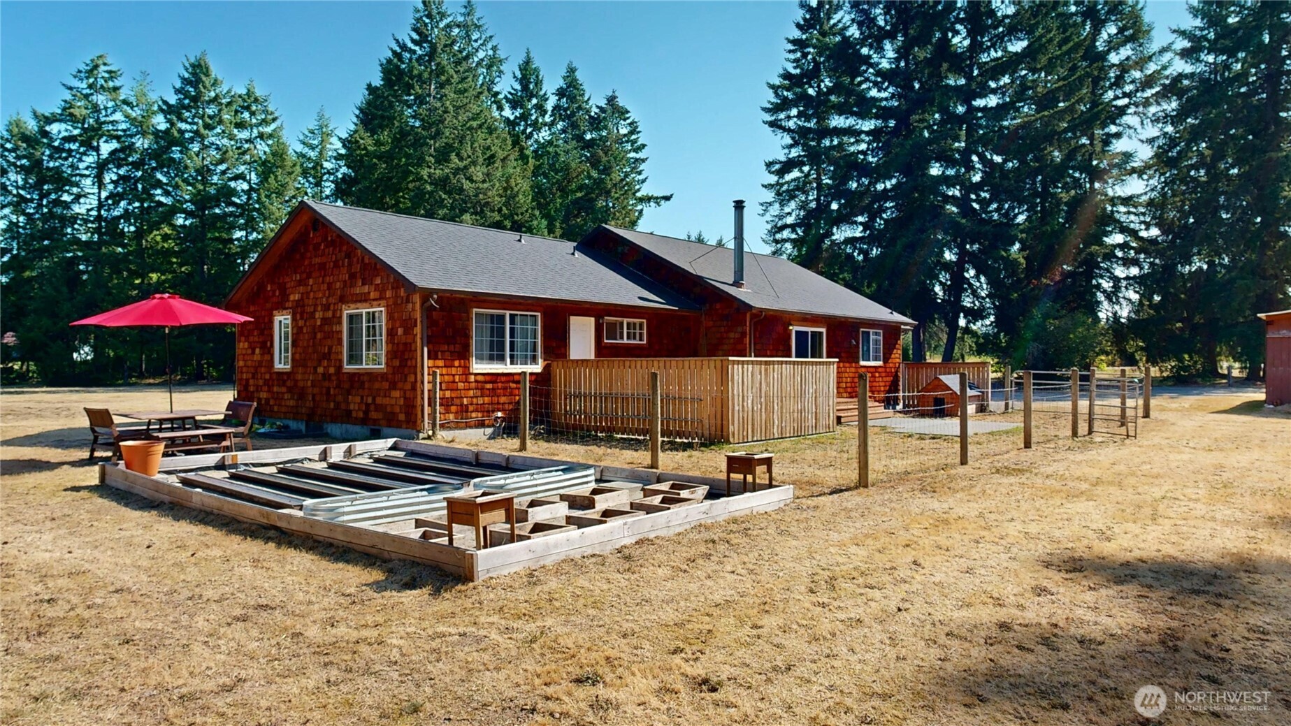 35812 Allen Road South Roy, WA 98580 - Photo 21 of 39 a swimming pool covered with tall trees