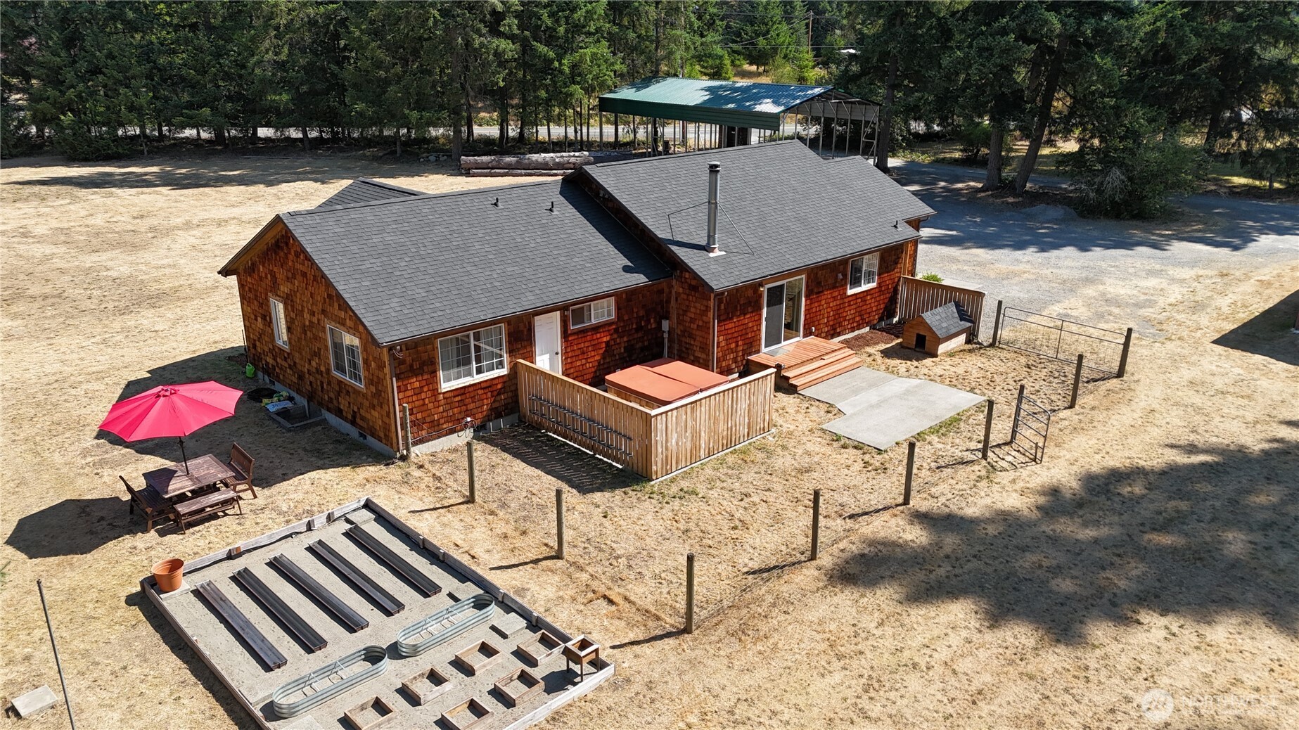 35812 Allen Road South Roy, WA 98580 - Photo 32 of 39 an aerial view of a house with table and chairs