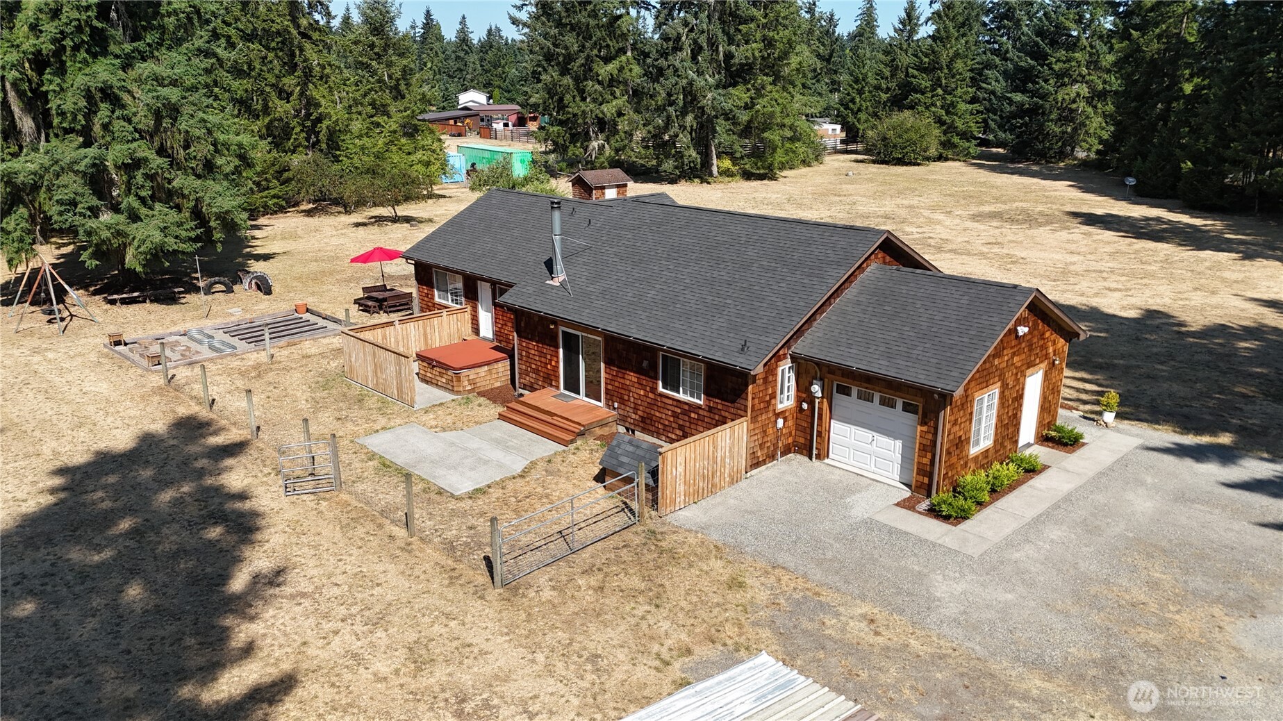 35812 Allen Road South Roy, WA 98580 - Photo 34 of 39 an aerial view of a house with swimming pool
