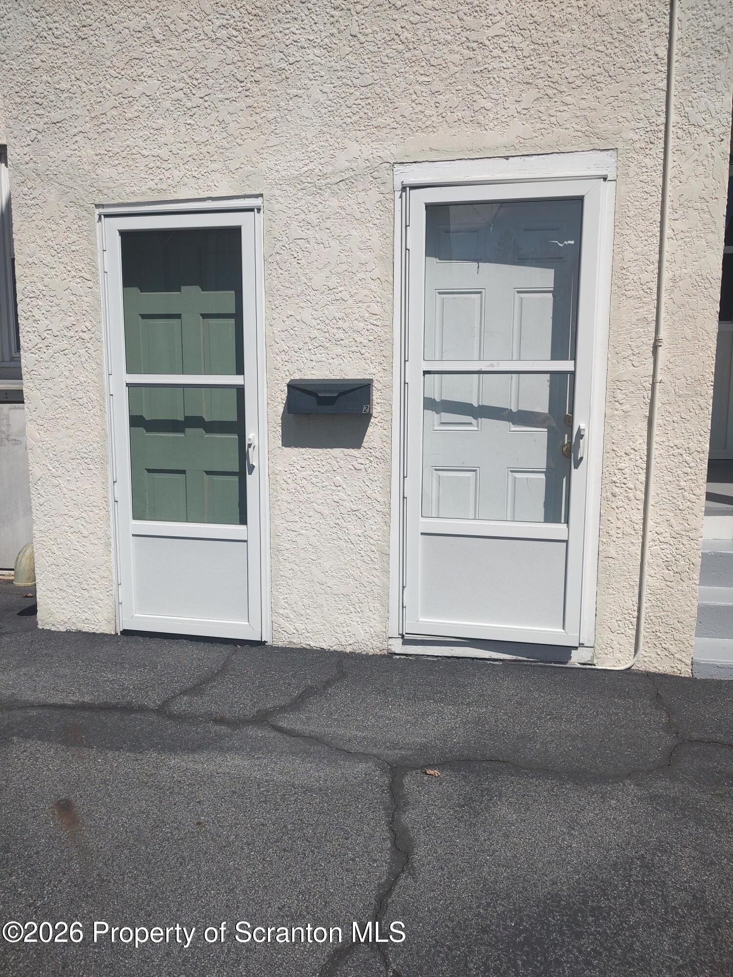 1019 Delaware Street, Unit 2 Scranton, PA 18509 - Photo 20 of 24 Right Side Entry Door