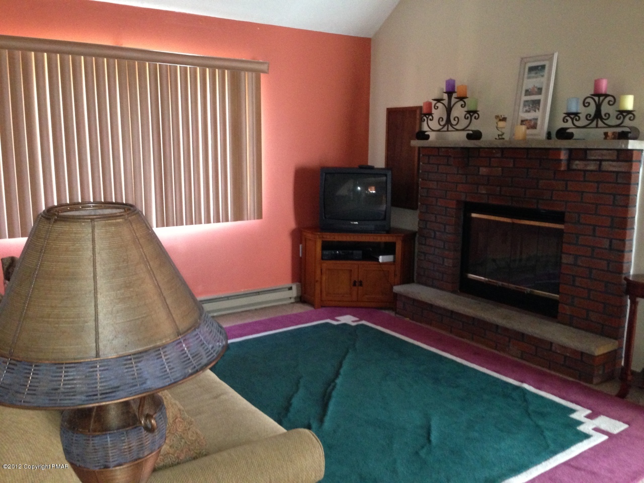 1237 Salisbury Road Bushkill, PA 18324 - Photo 7 of 11 a living room with furniture and a fireplace
