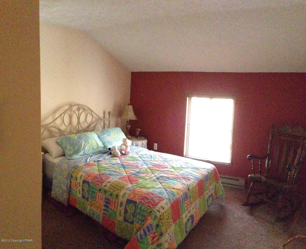1237 Salisbury Road Bushkill, PA 18324 - Photo 9 of 11 a bedroom with a bed and a chair