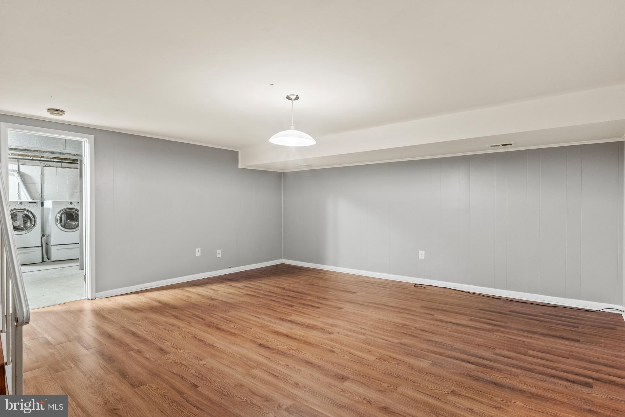 1204 Cedar Park Road, Unit 6 Annapolis, MD 21401 - Photo 16 of 51 a view of an empty room with wooden floor