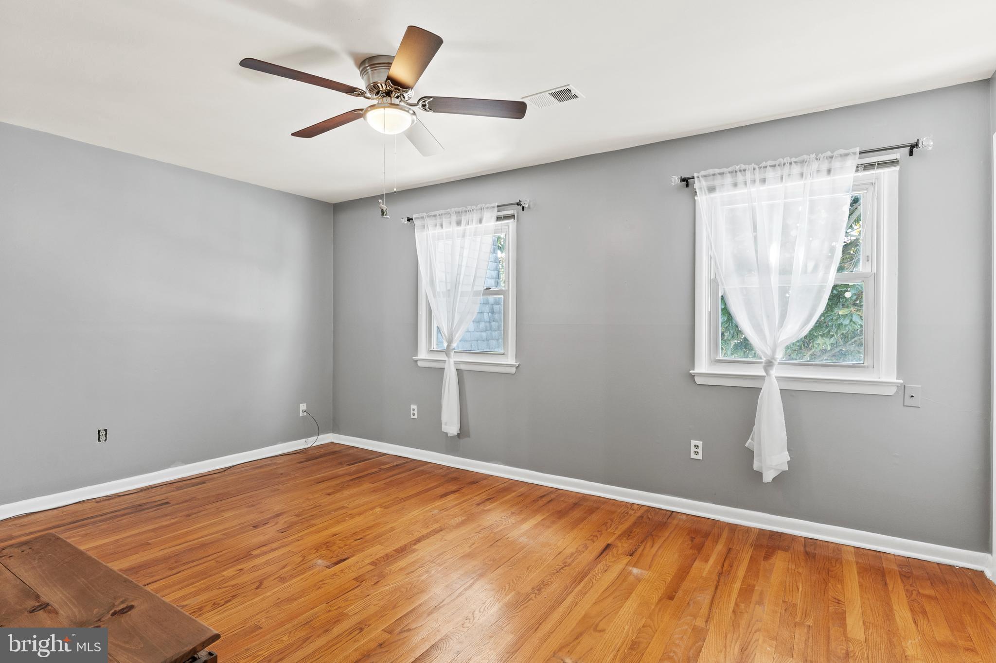 1204 Cedar Park Road, Unit 6 Annapolis, MD 21401 - Photo 18 of 51 wooden floor in an empty room with a window