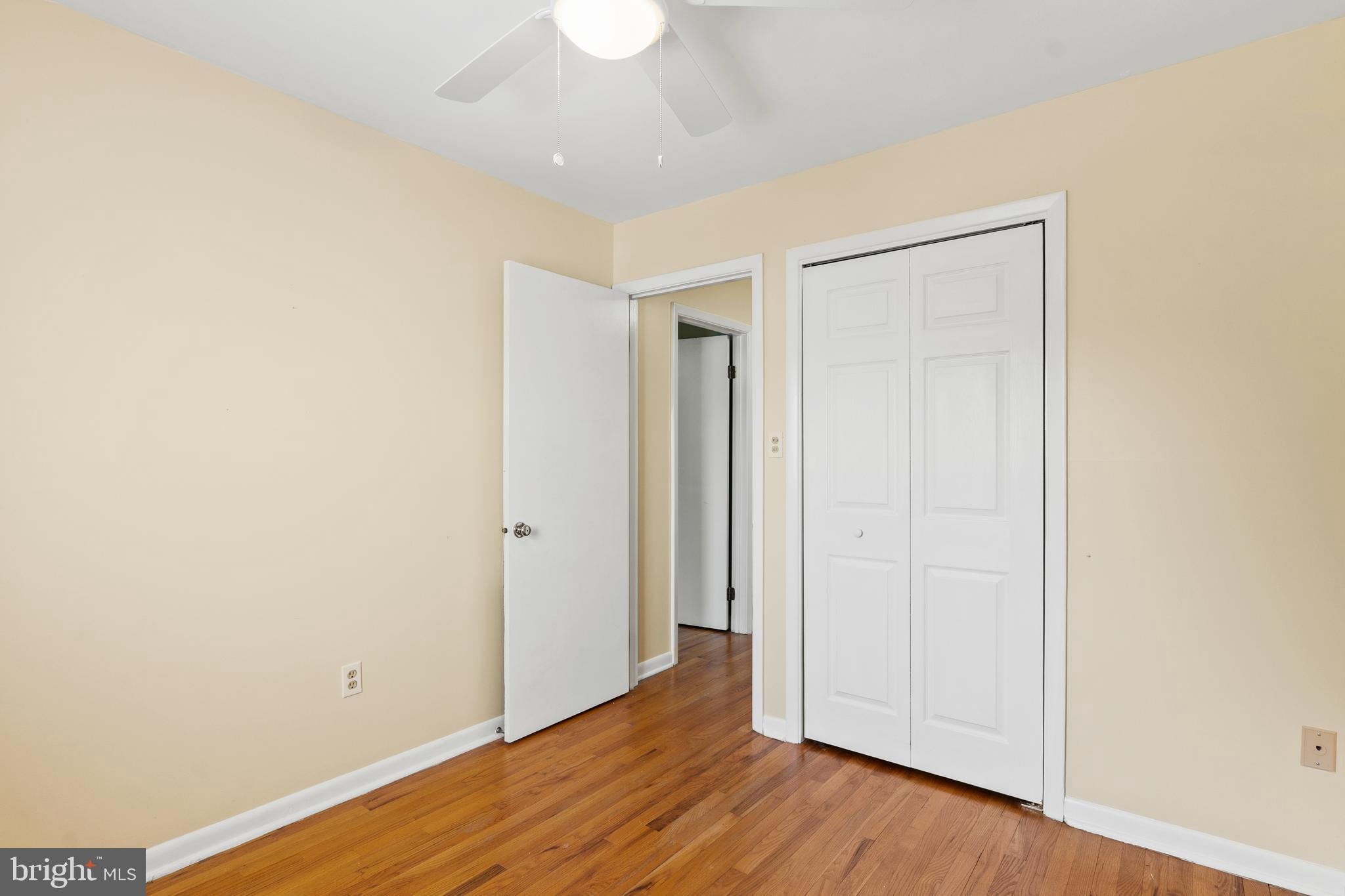 1204 Cedar Park Road, Unit 6 Annapolis, MD 21401 - Photo 26 of 51 a view of an empty room with wooden floor