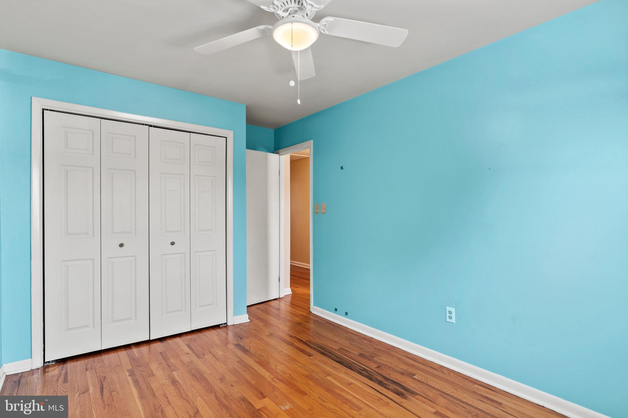 1204 Cedar Park Road, Unit 6 Annapolis, MD 21401 - Photo 28 of 51 an empty room with wooden floor and fan