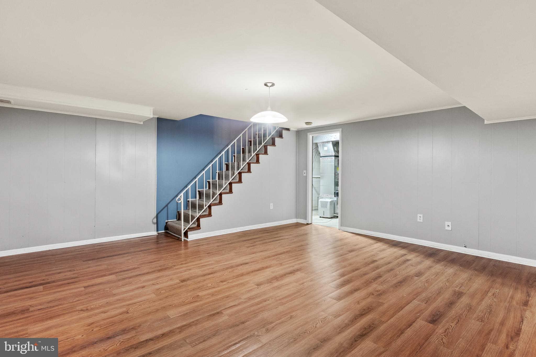 1204 Cedar Park Road, Unit 6 Annapolis, MD 21401 - Photo 34 of 51 a view of an empty room with wooden floor