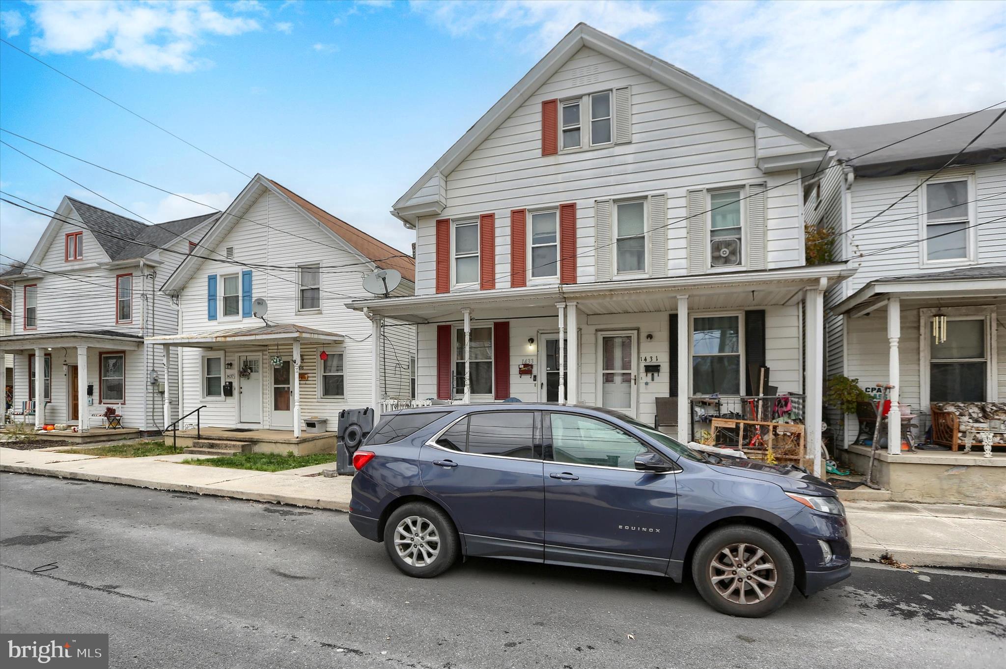 1433 3rd Street Enola, PA 17025 - Photo 3 of 29 a car parked in front of a house