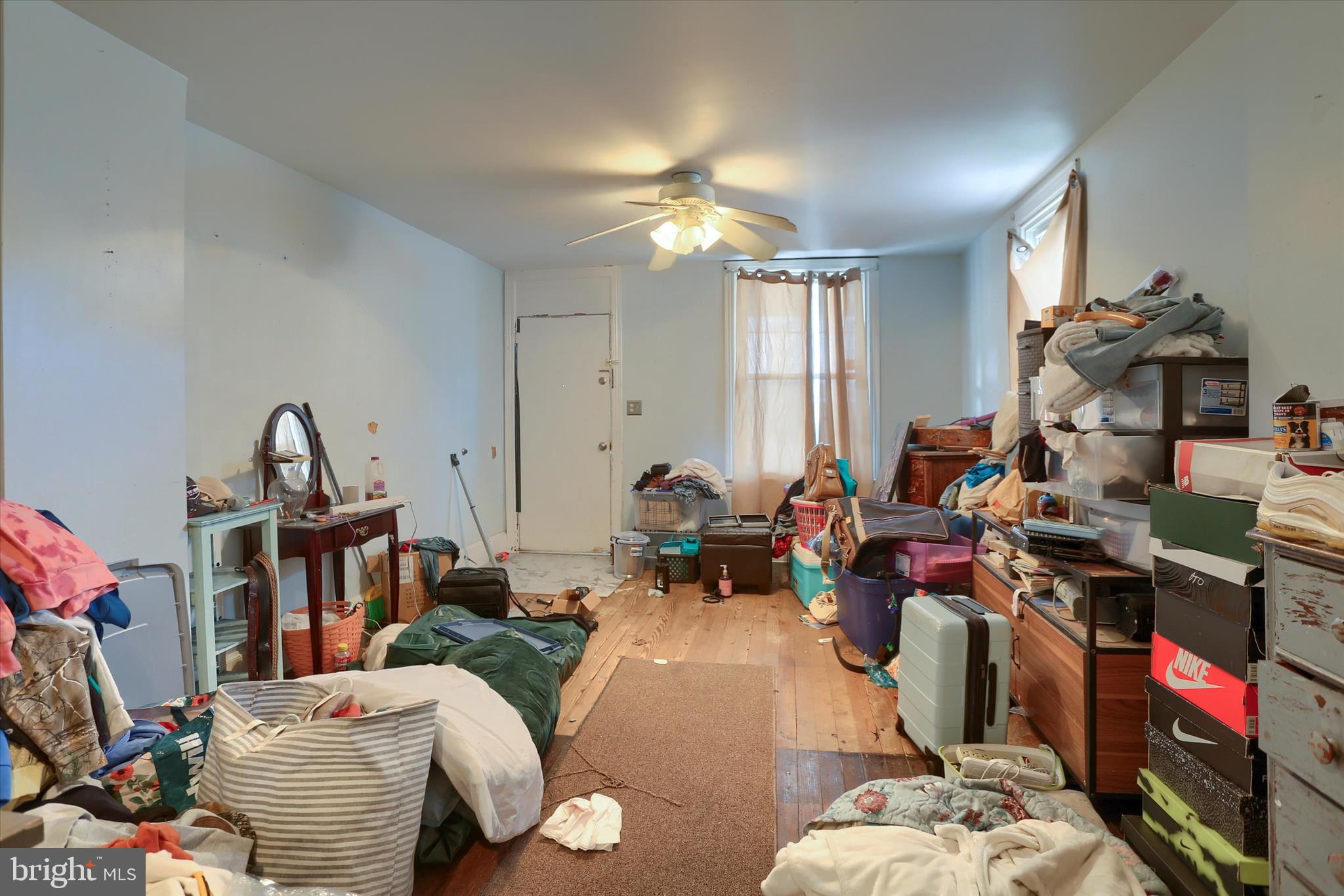 1433 3rd Street Enola, PA 17025 - Photo 6 of 29 a living room with furniture and a chandelier