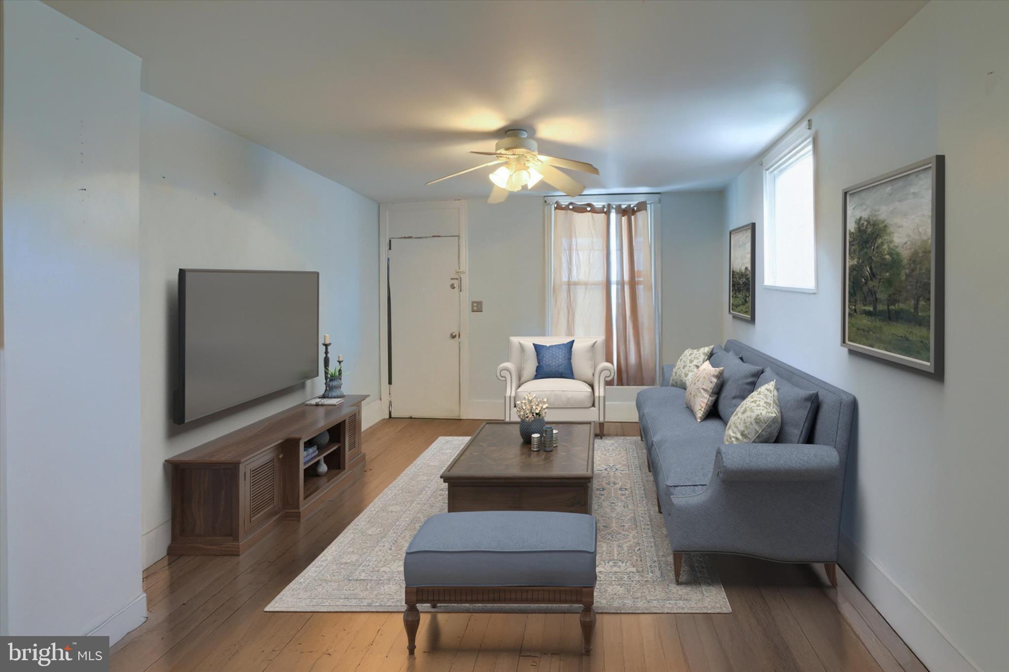 1433 3rd Street Enola, PA 17025 - Photo 7 of 29 a living room with furniture and a flat screen tv