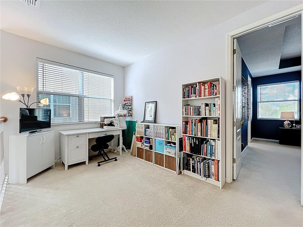 6573 Helmsley Circle Windermere, FL 34786 - Photo 33 of 54 a room with furniture and white cabinets