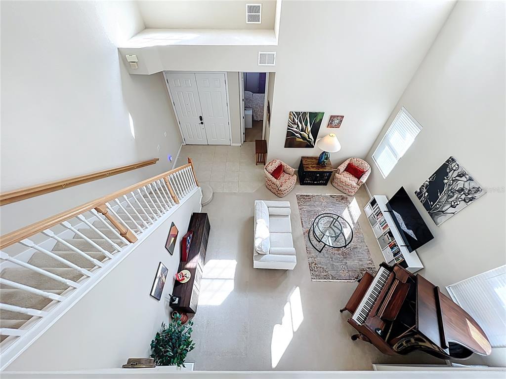 6573 Helmsley Circle Windermere, FL 34786 - Photo 35 of 54 a view of gym equipment with wooden floor