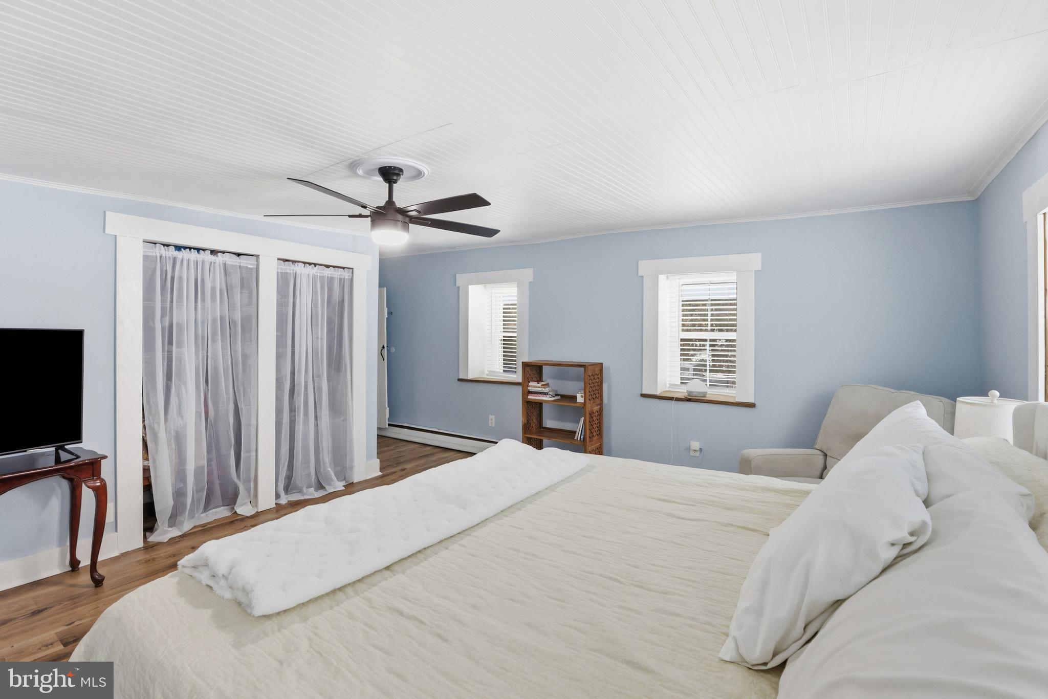 15539 Liberty Road Mount Airy, MD 21771 - Photo 23 of 68 a bedroom with a large bed and a window
