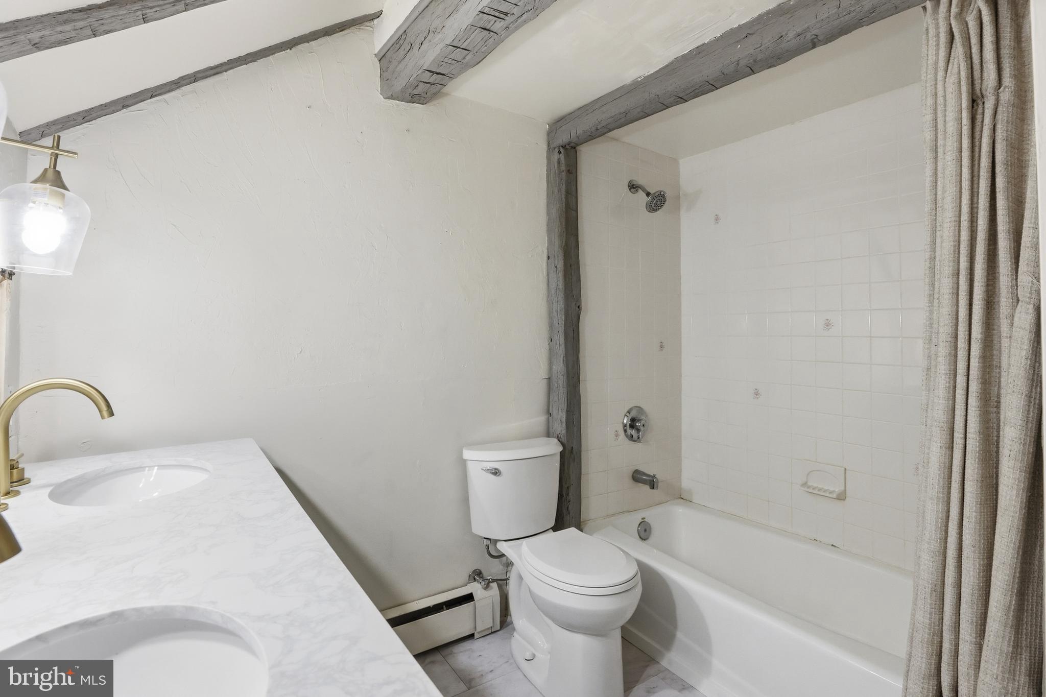 15539 Liberty Road Mount Airy, MD 21771 - Photo 25 of 68 a bathroom with a sink toilet and shower