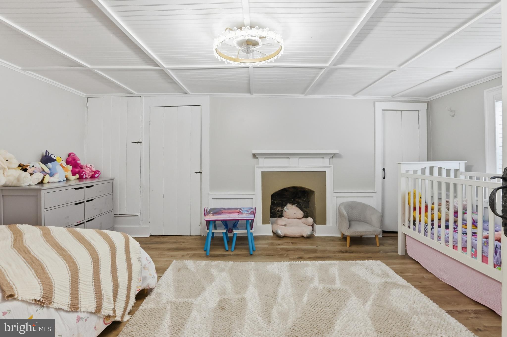 15539 Liberty Road Mount Airy, MD 21771 - Photo 26 of 68 a bedroom with a bed and a fireplace