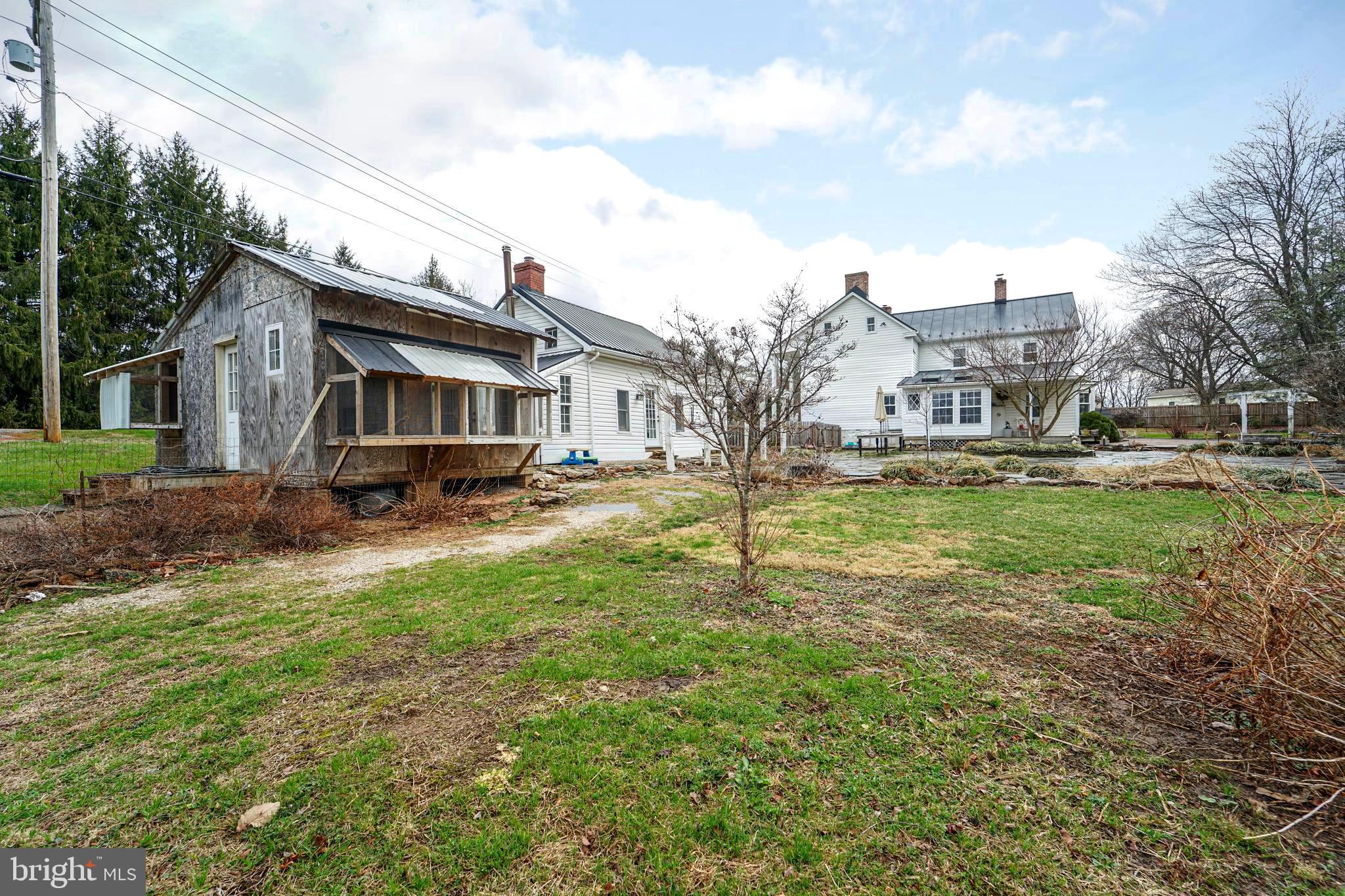 15539 Liberty Road Mount Airy, MD 21771 - Photo 45 of 68 a view of a house with a yard and sitting area