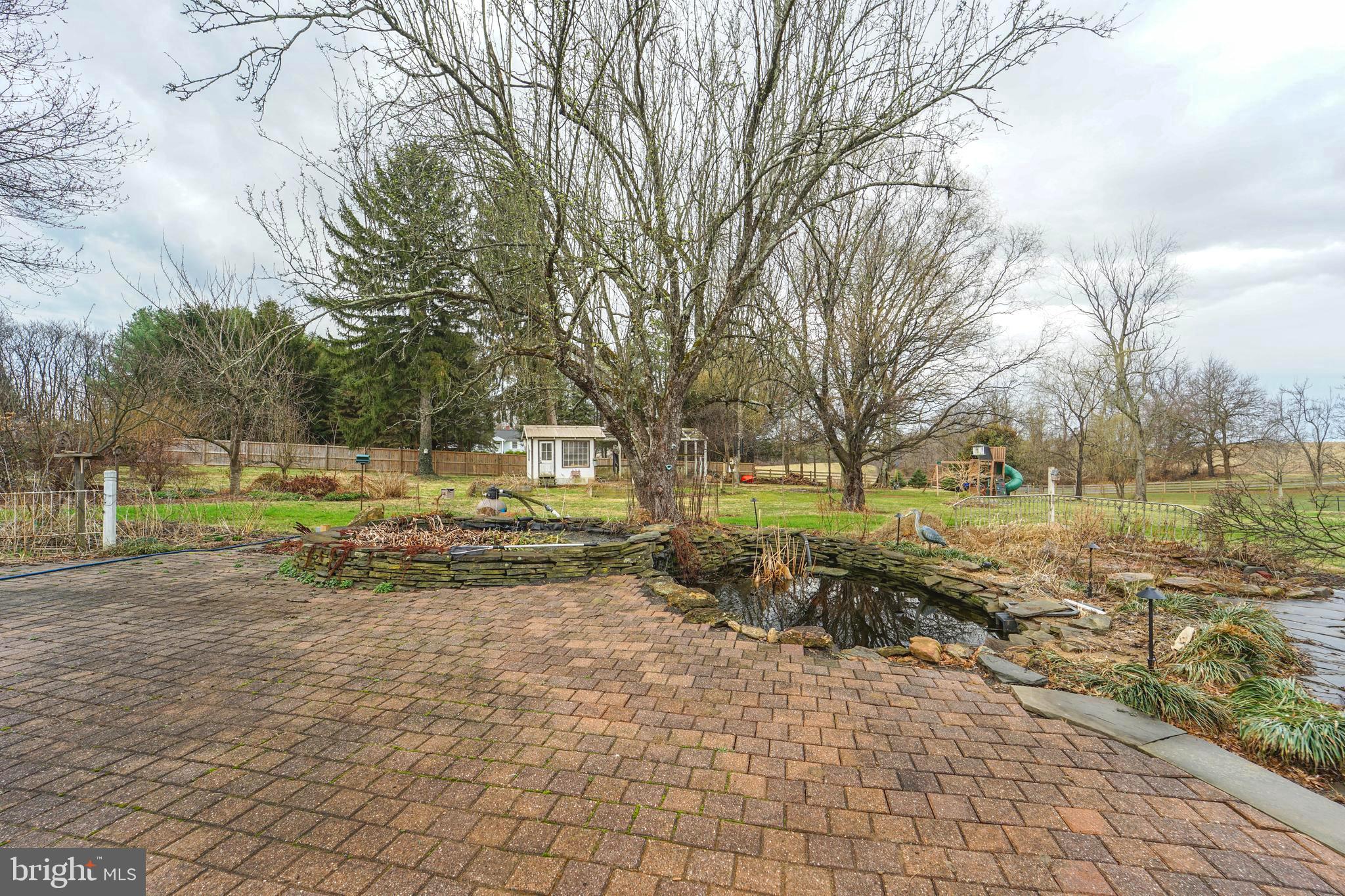 15539 Liberty Road Mount Airy, MD 21771 - Photo 50 of 68 a view of a yard with plants and trees
