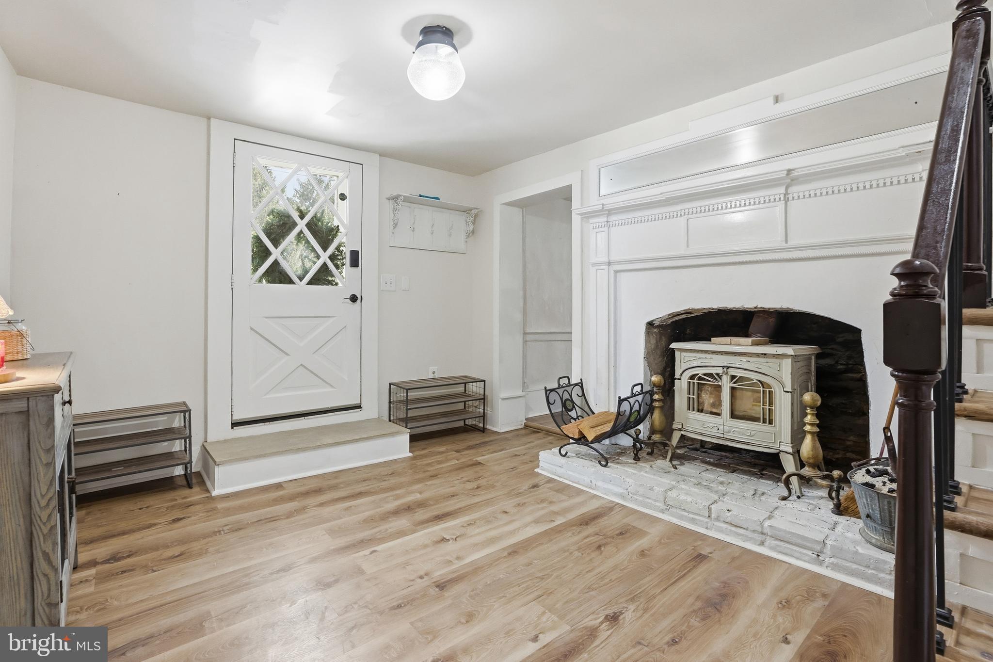 15539 Liberty Road Mount Airy, MD 21771 - Photo 5 of 68 a living room with furniture and a fireplace