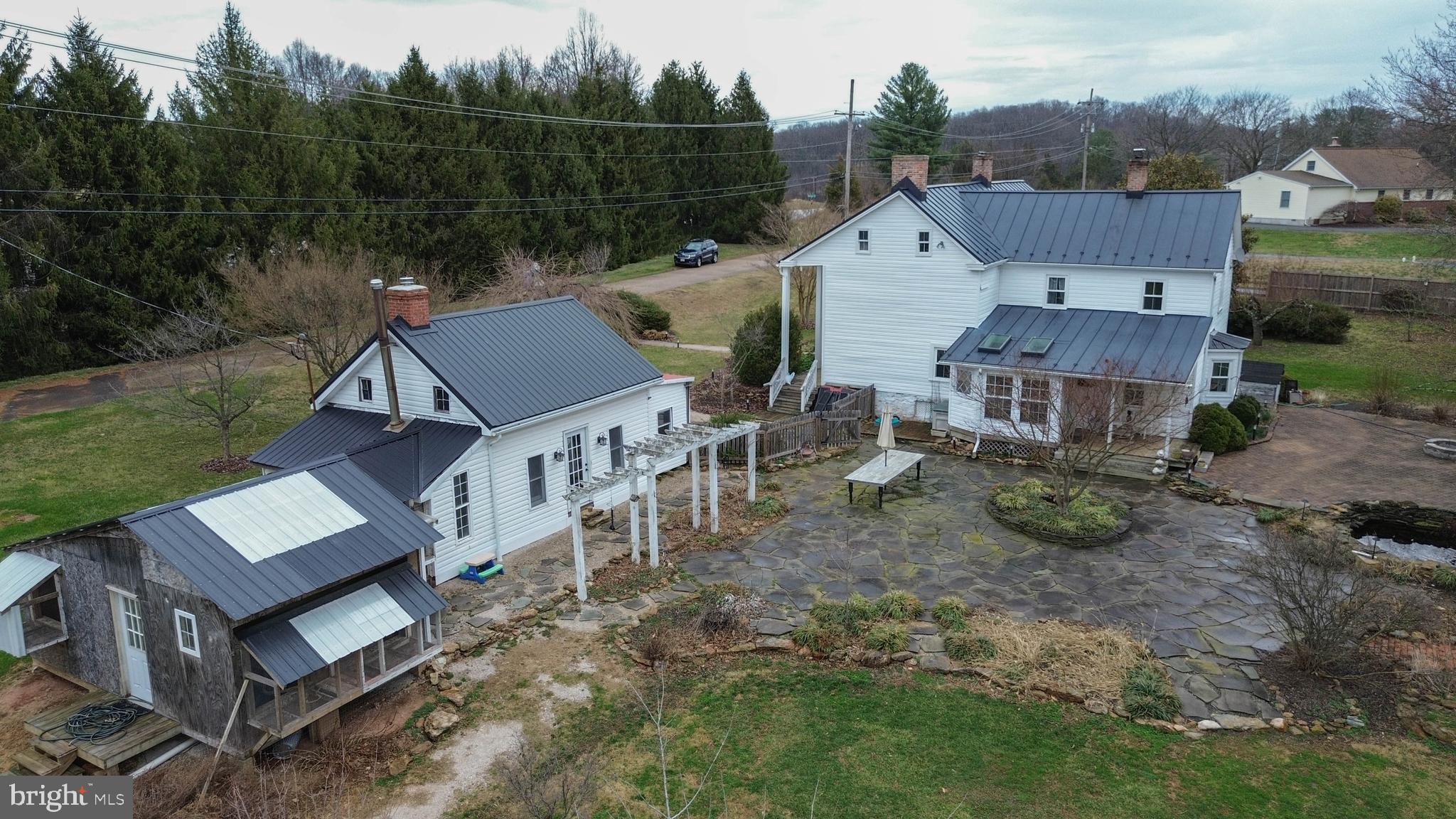 15539 Liberty Road Mount Airy, MD 21771 - Photo 56 of 68 an aerial view of a house with a yard