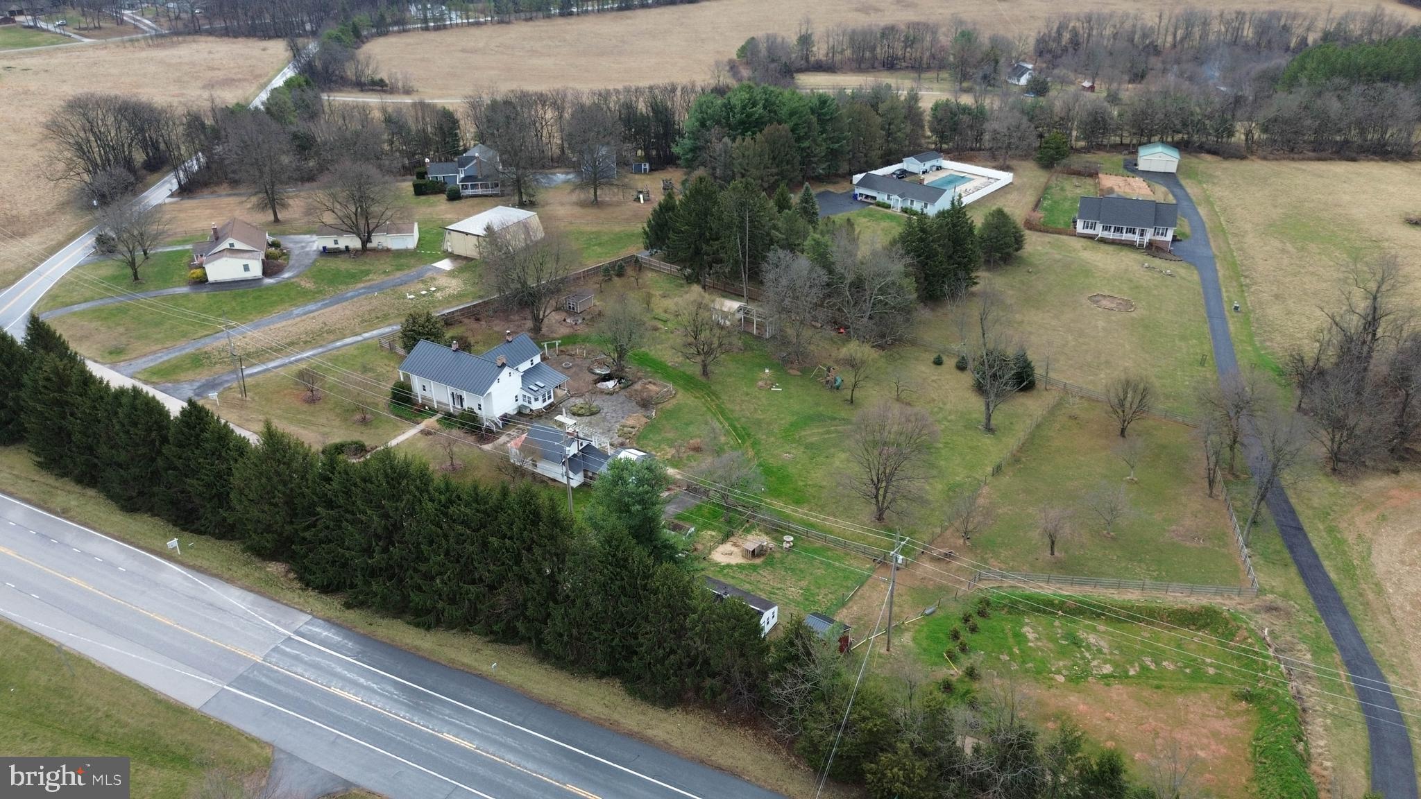 15539 Liberty Road Mount Airy, MD 21771 - Photo 59 of 68 a view of a lake with a yard and green space