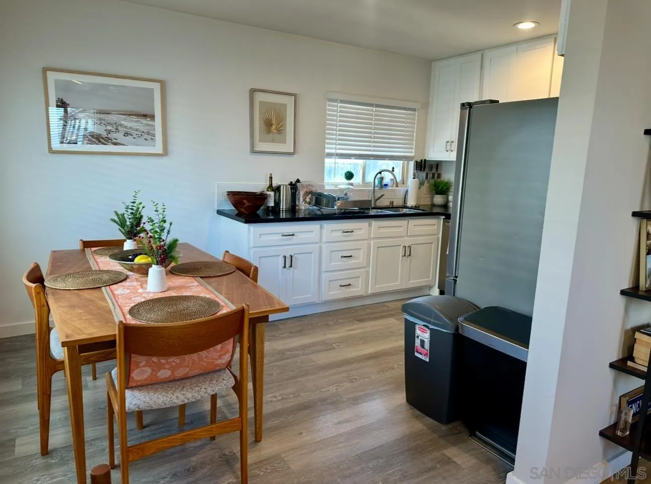526 4th Street Encinitas, CA 92024 - Photo 2 of 10 a kitchen with stainless steel appliances granite countertop a refrigerator and a stove top oven